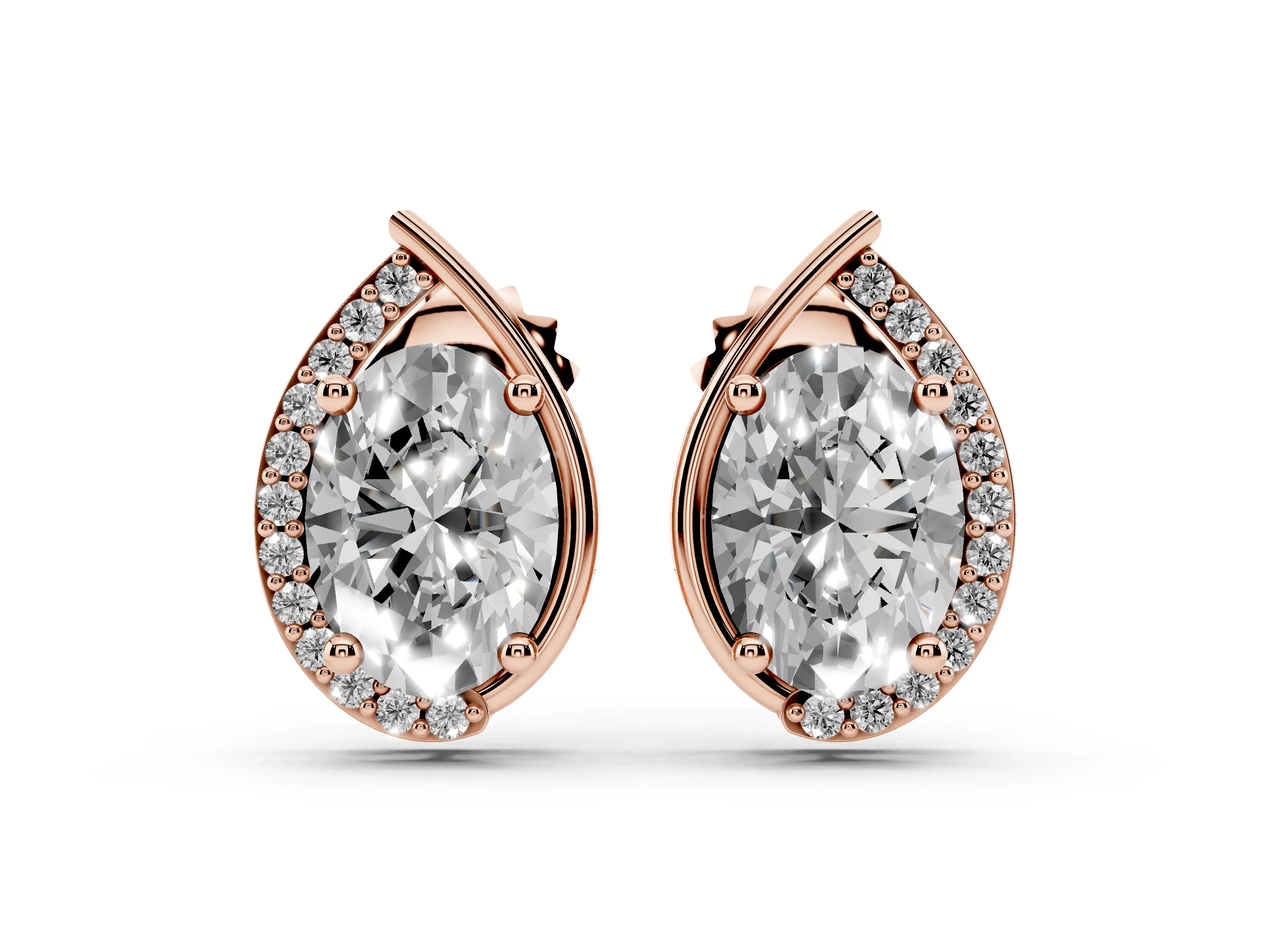 Oval Diamond Teardrop Framed Stud Earrings Set in Rose gold with Accent Stones