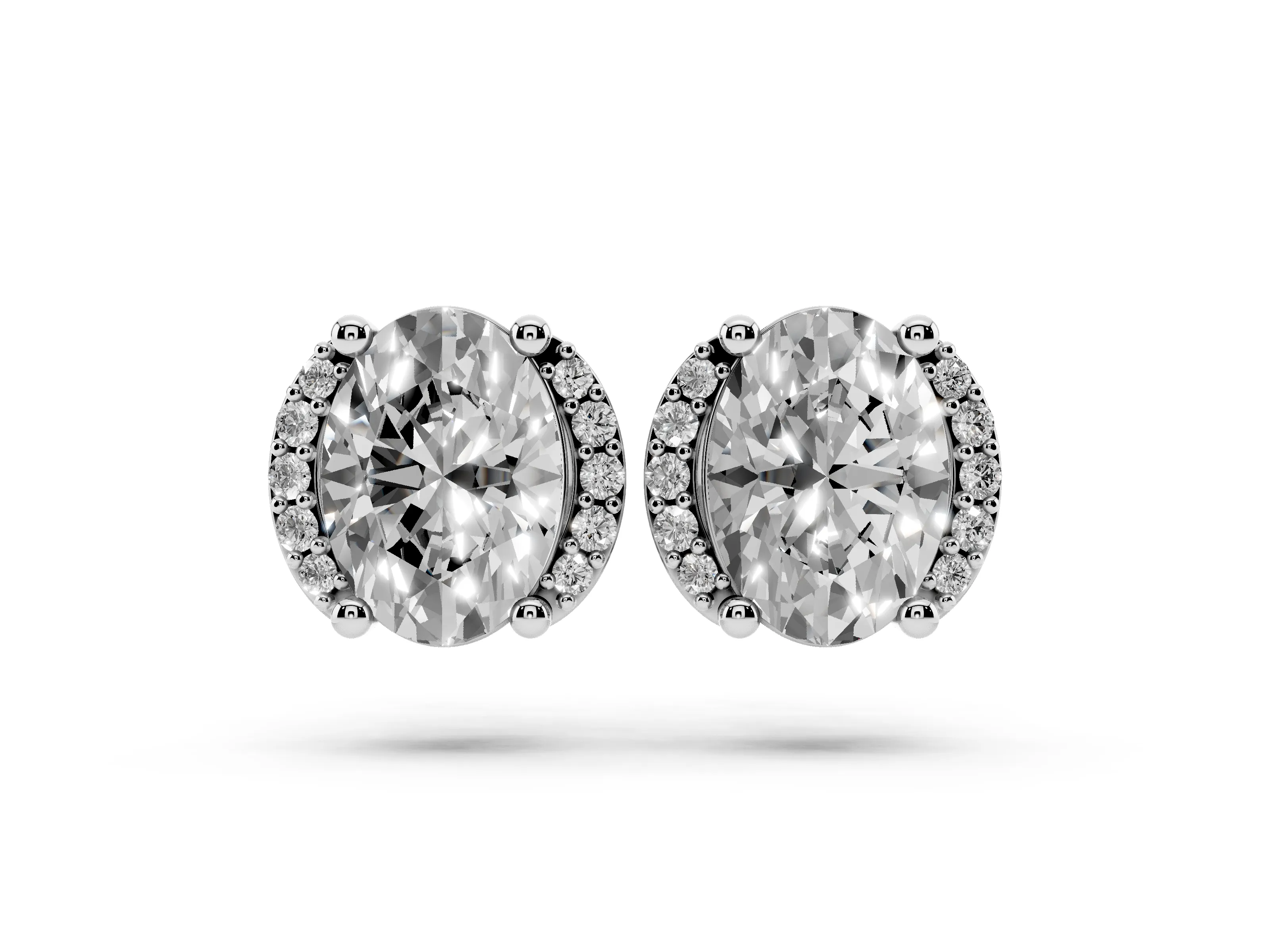 Oval Diamond Half Halo Stud Earrings Set in Platinum with Accent Halo