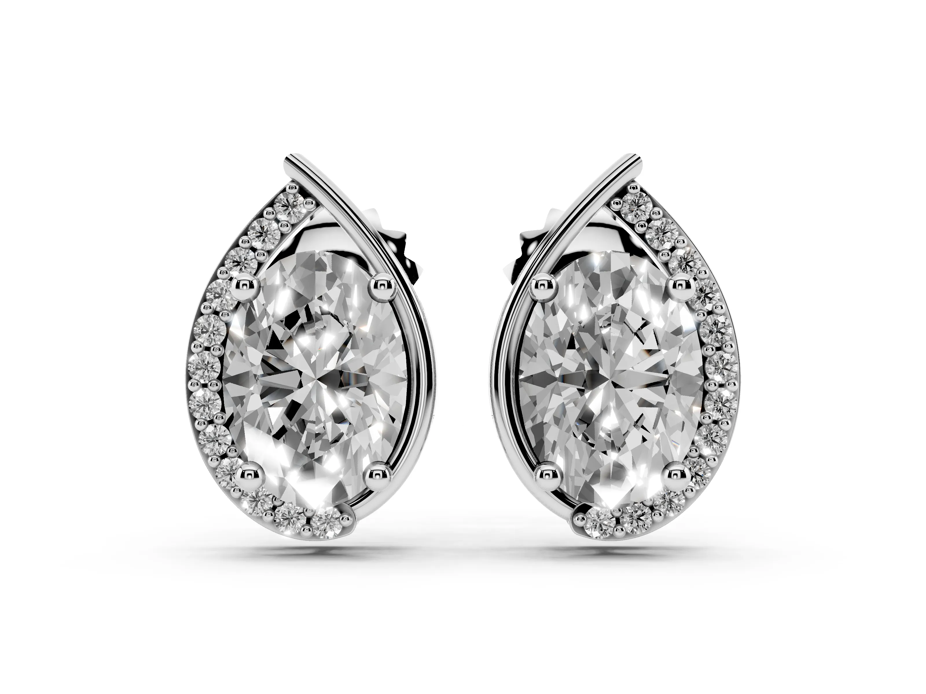 Oval Diamond Teardrop Framed Stud Earrings Set in Platinum with Accent Stones