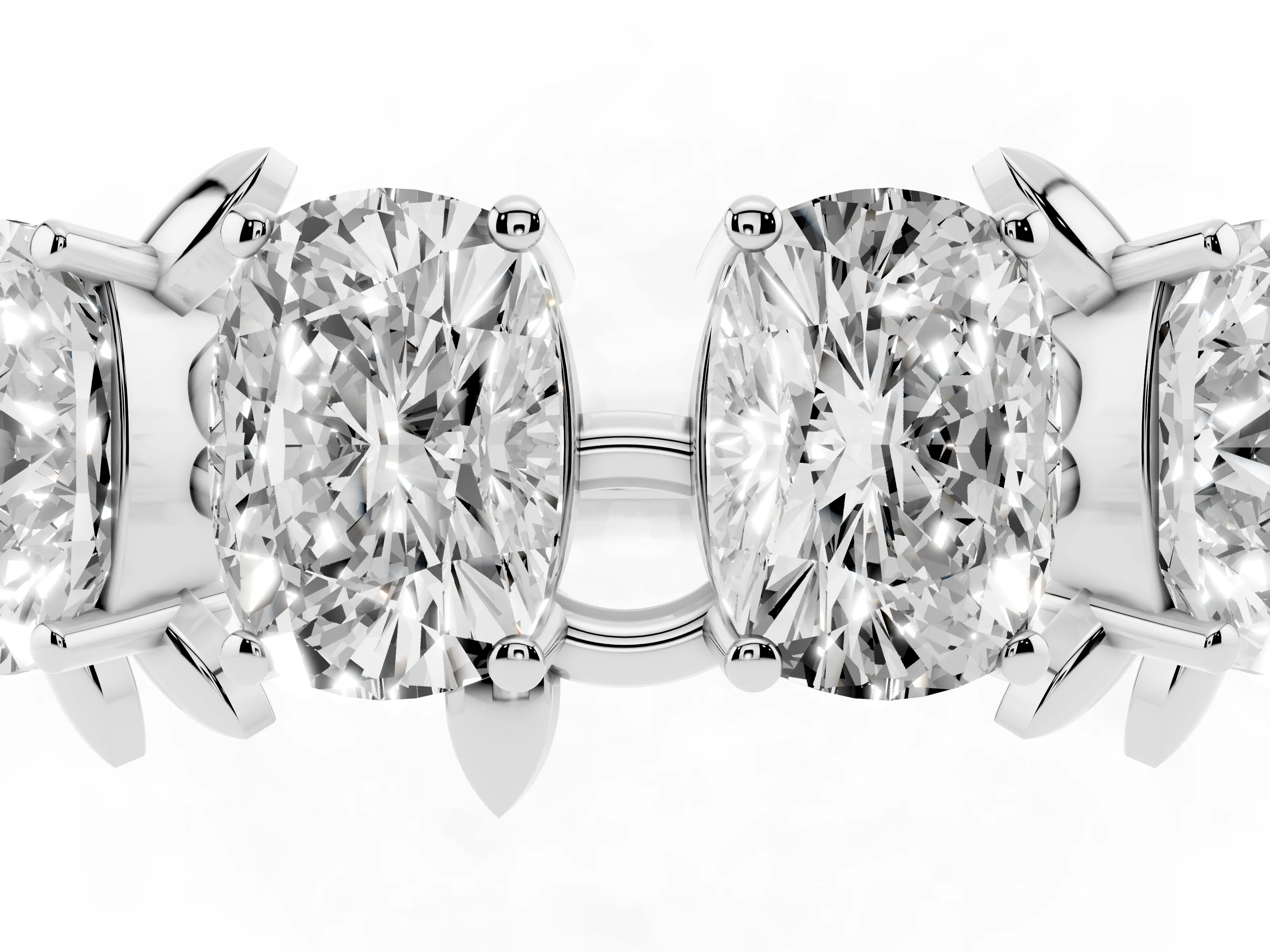 Elongated Cushion Diamond Four-Stone Band Set in White gold with Leaf Prong Setting