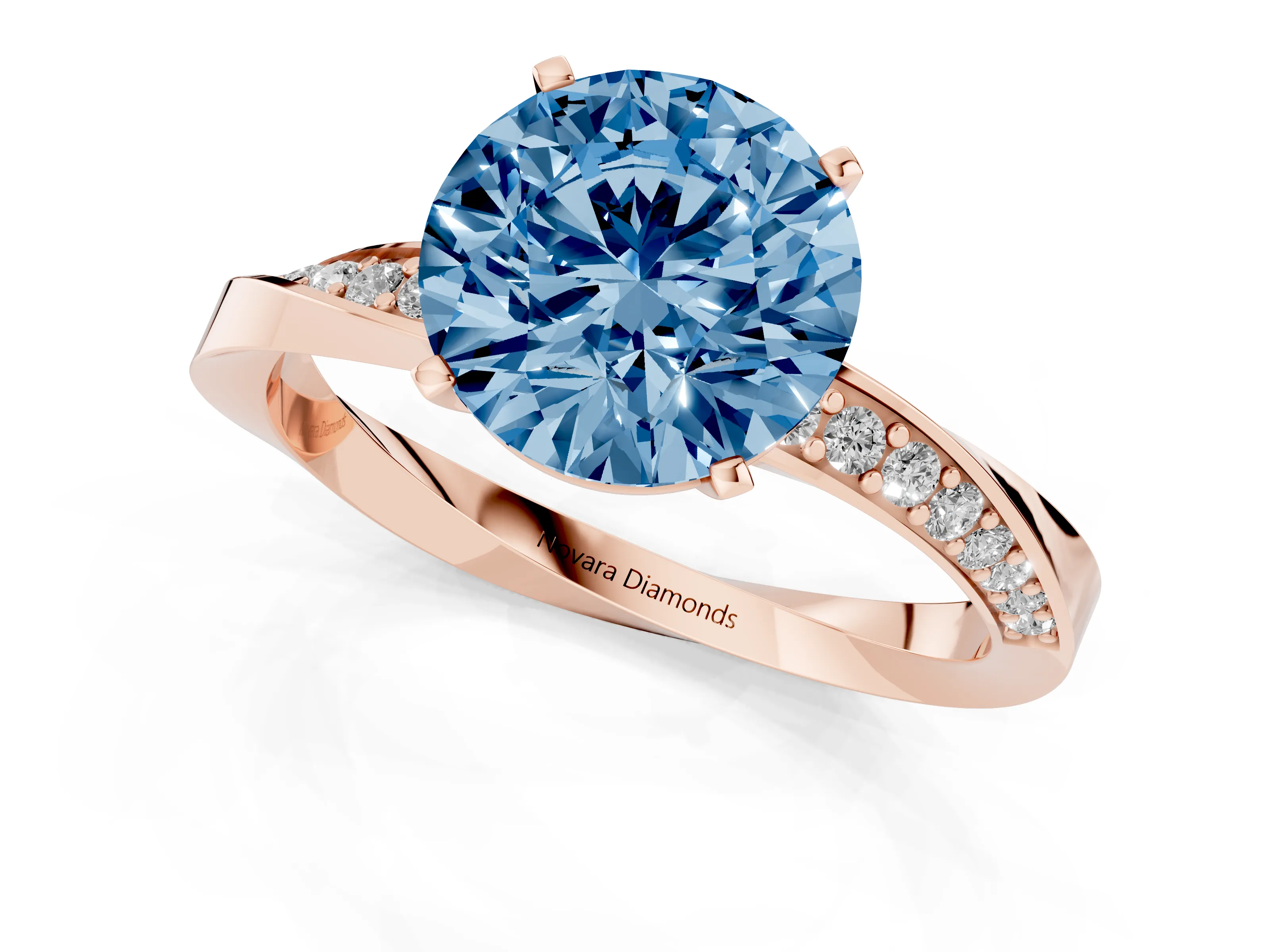 Fancy Blue Round Cut Diamond Engagement Ring Set in Rose gold with Side Stone Accents and Prong Setting