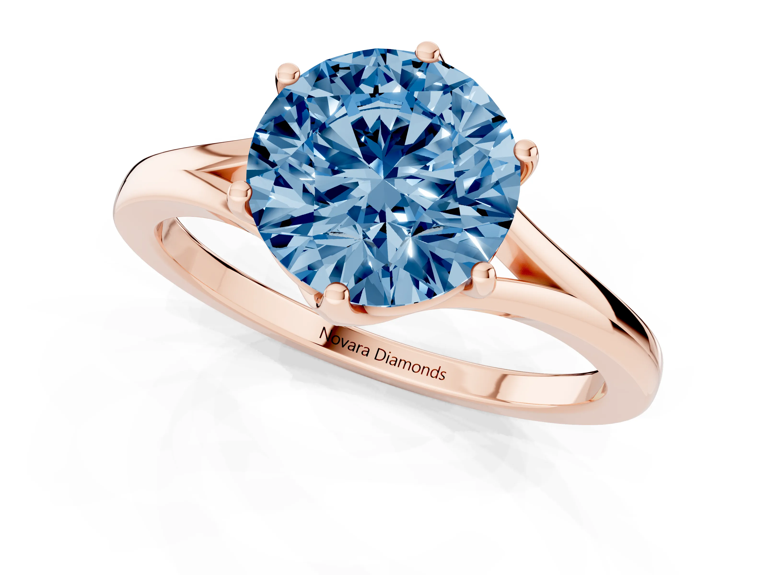 Fancy Blue Round Cut Diamond Solitaire Ring Set in Rose gold with Polished Tapered Band and Prong Setting