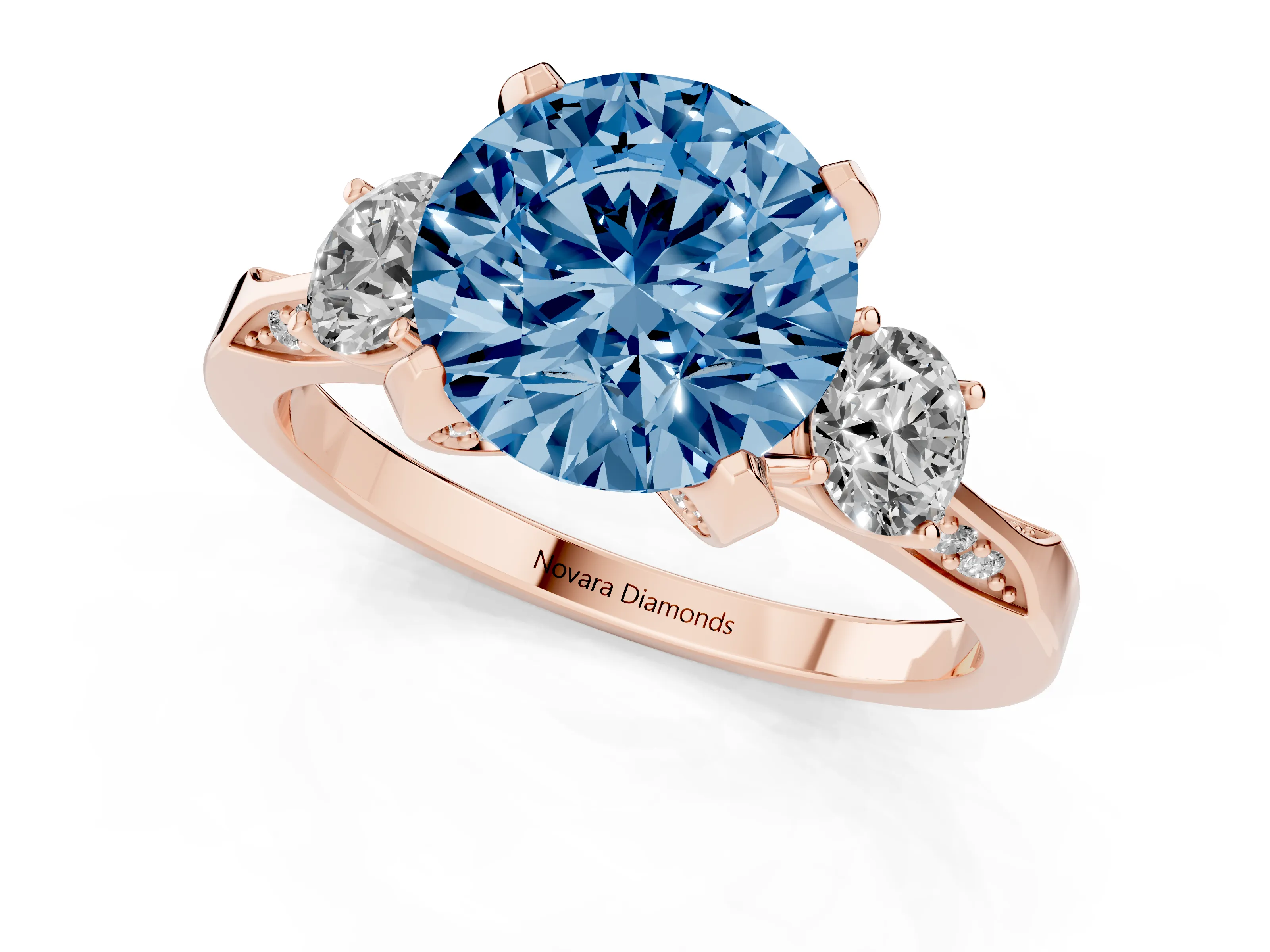 Fancy Blue Round Cut Diamond Three-Stone Ring Set in Rose gold with Pavé Band and Smaller Side Stones