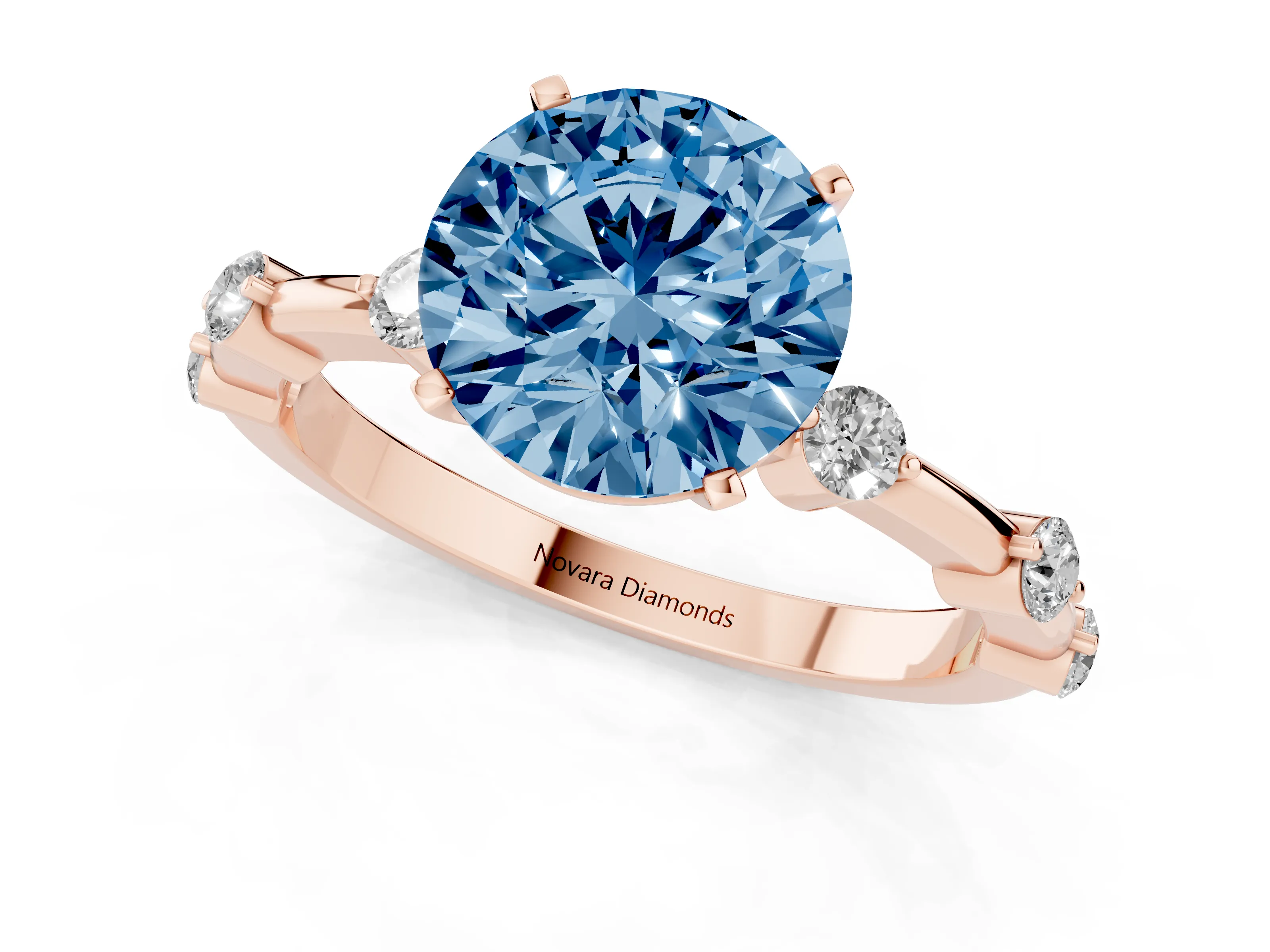Fancy Blue Round Cut Diamond Solitaire Ring Set in Rose gold with Bezel Set Side Stones and Prong Setting