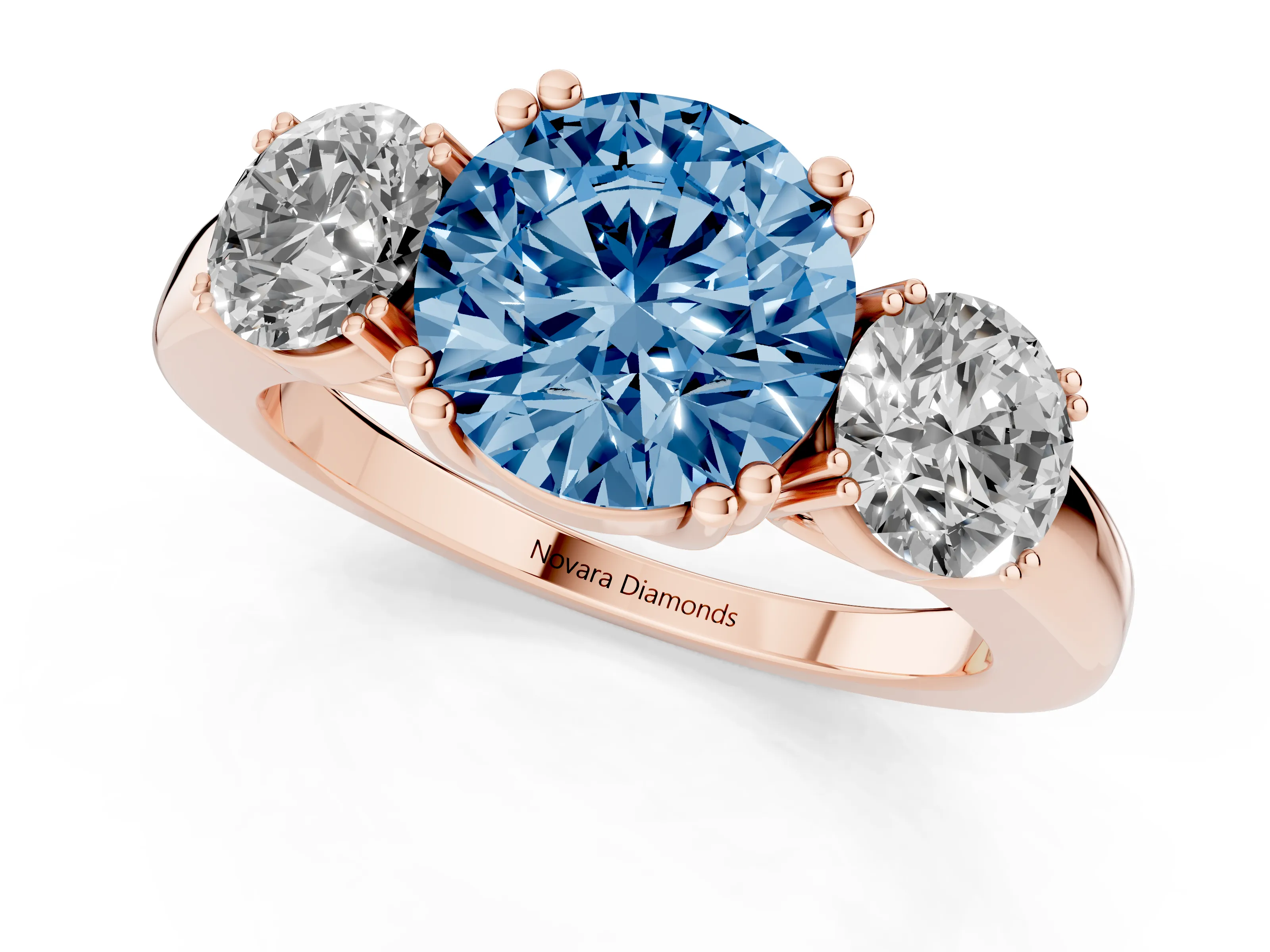 Fancy Blue Round Cut Diamond Three-Stone Ring Set in Rose gold with Polished Channel-Set Band