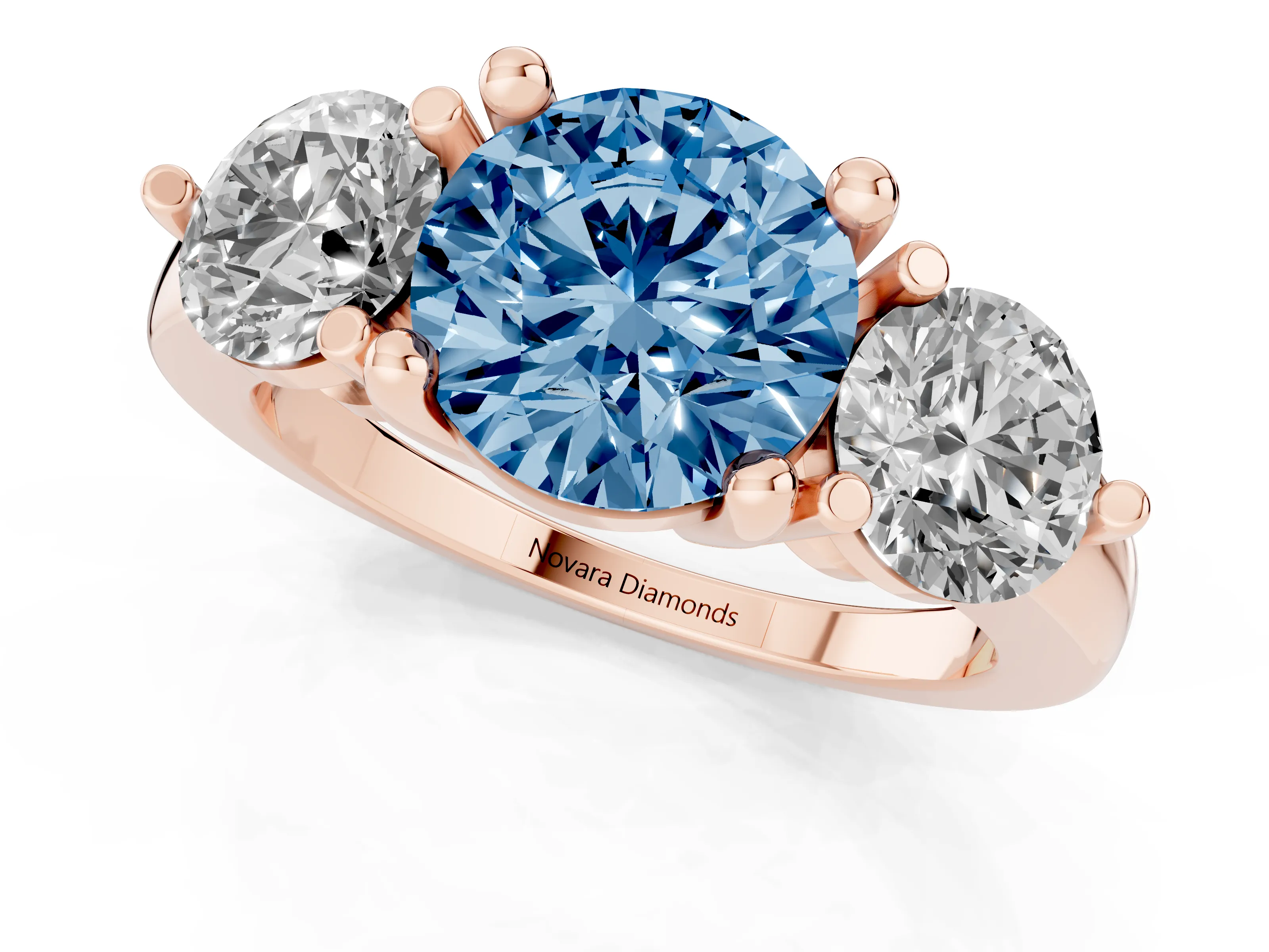 Fancy Blue Round Cut Diamond Three-Stone Ring Set in Rose gold with Prong Setting and Classic Band