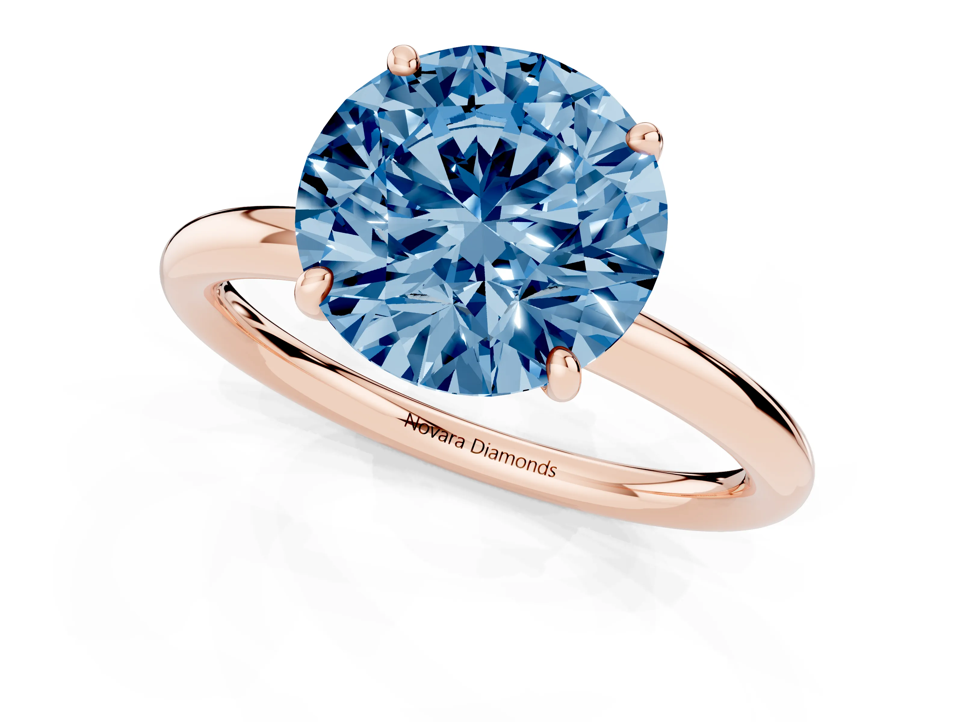 Fancy Blue Round Cut Diamond Solitaire Ring Set in Rose gold with Prong Setting on a Polished Plain Band
