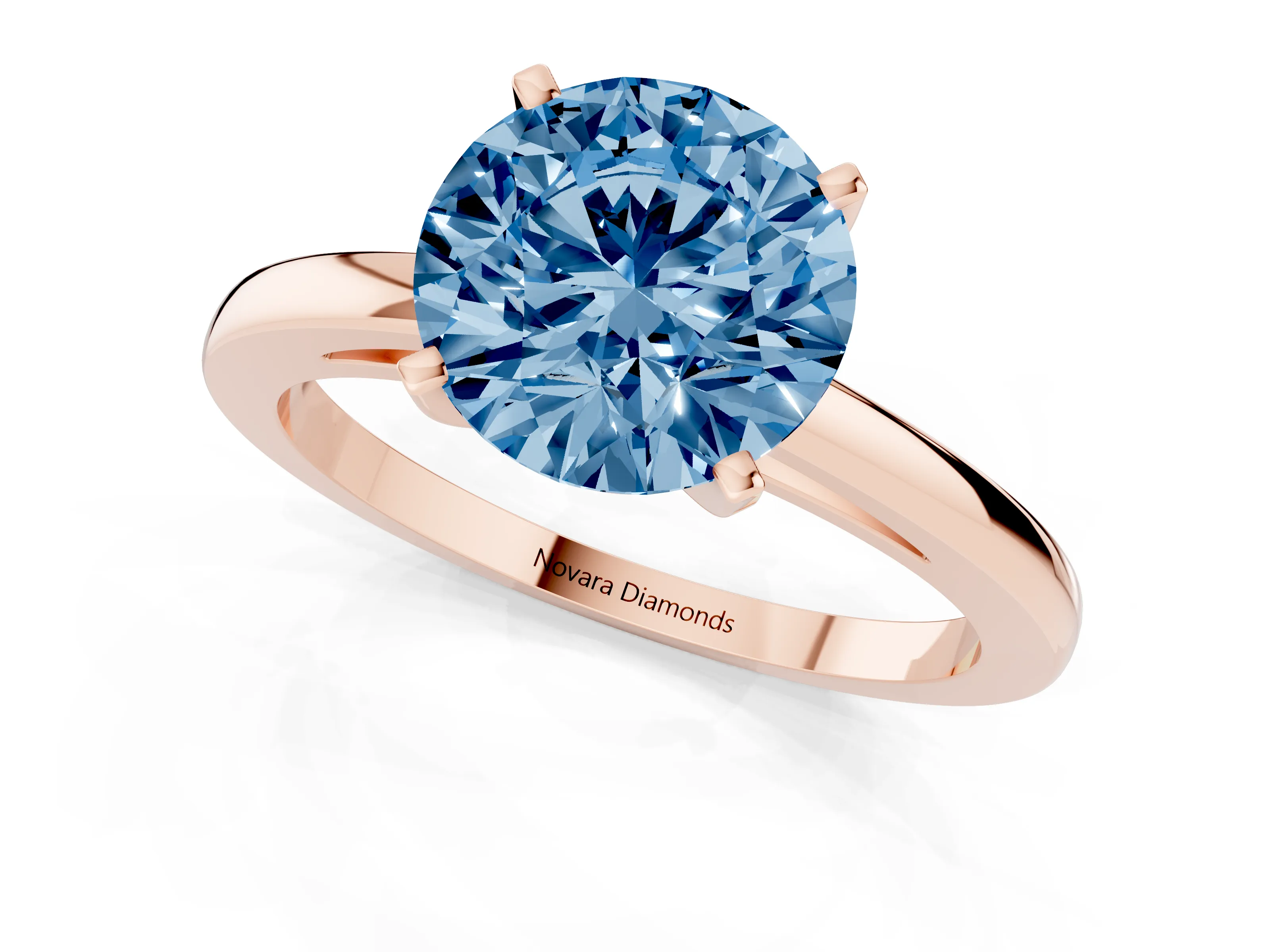 Fancy Blue Round Cut Diamond Solitaire Engagement Ring Set in Rose gold with Prong Setting on a Classic Band