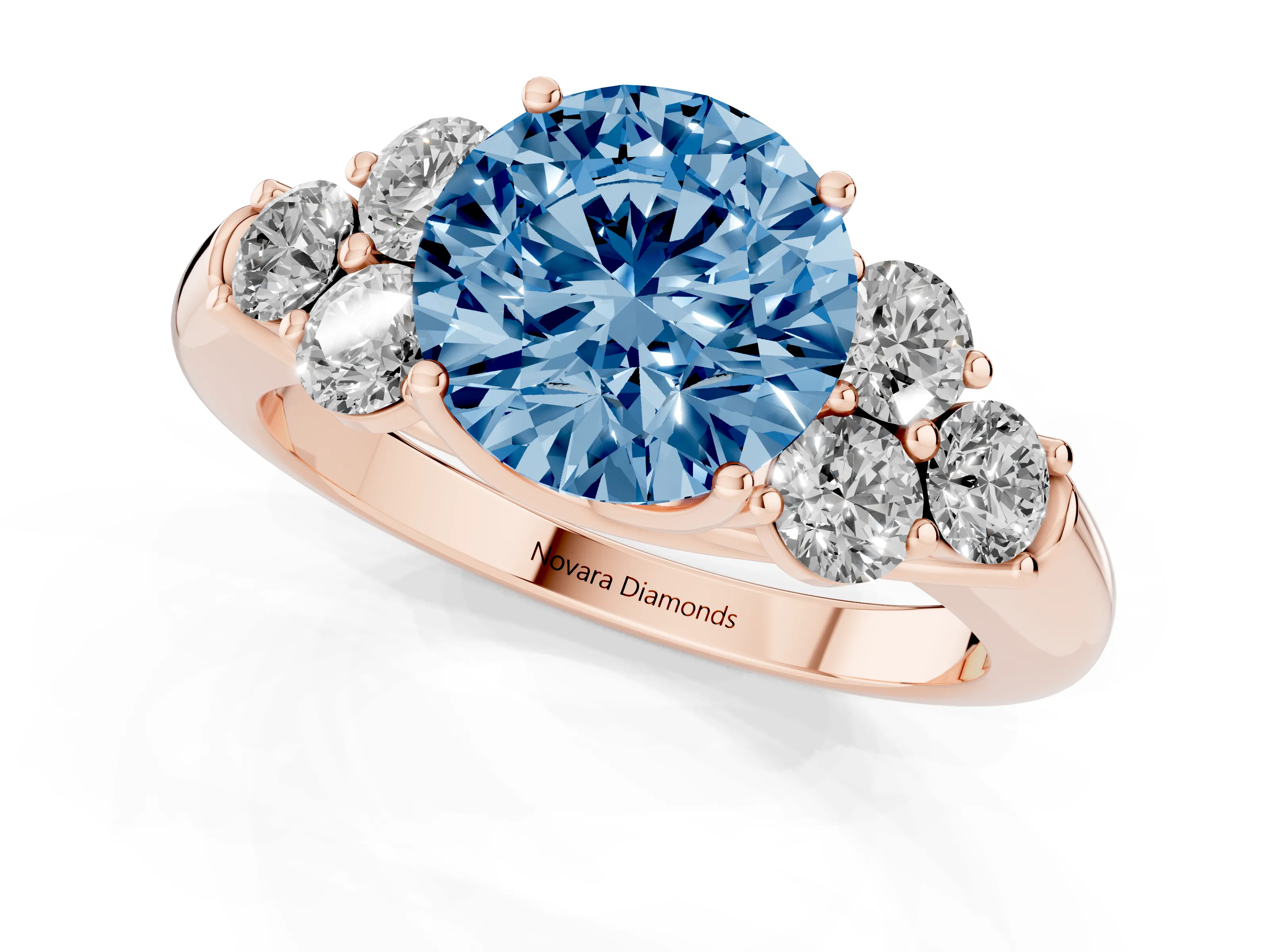 Fancy Blue Round Cut Diamond Cluster Ring Set in Rose gold with Round Accent Stones and Prong Setting on a Plain Band