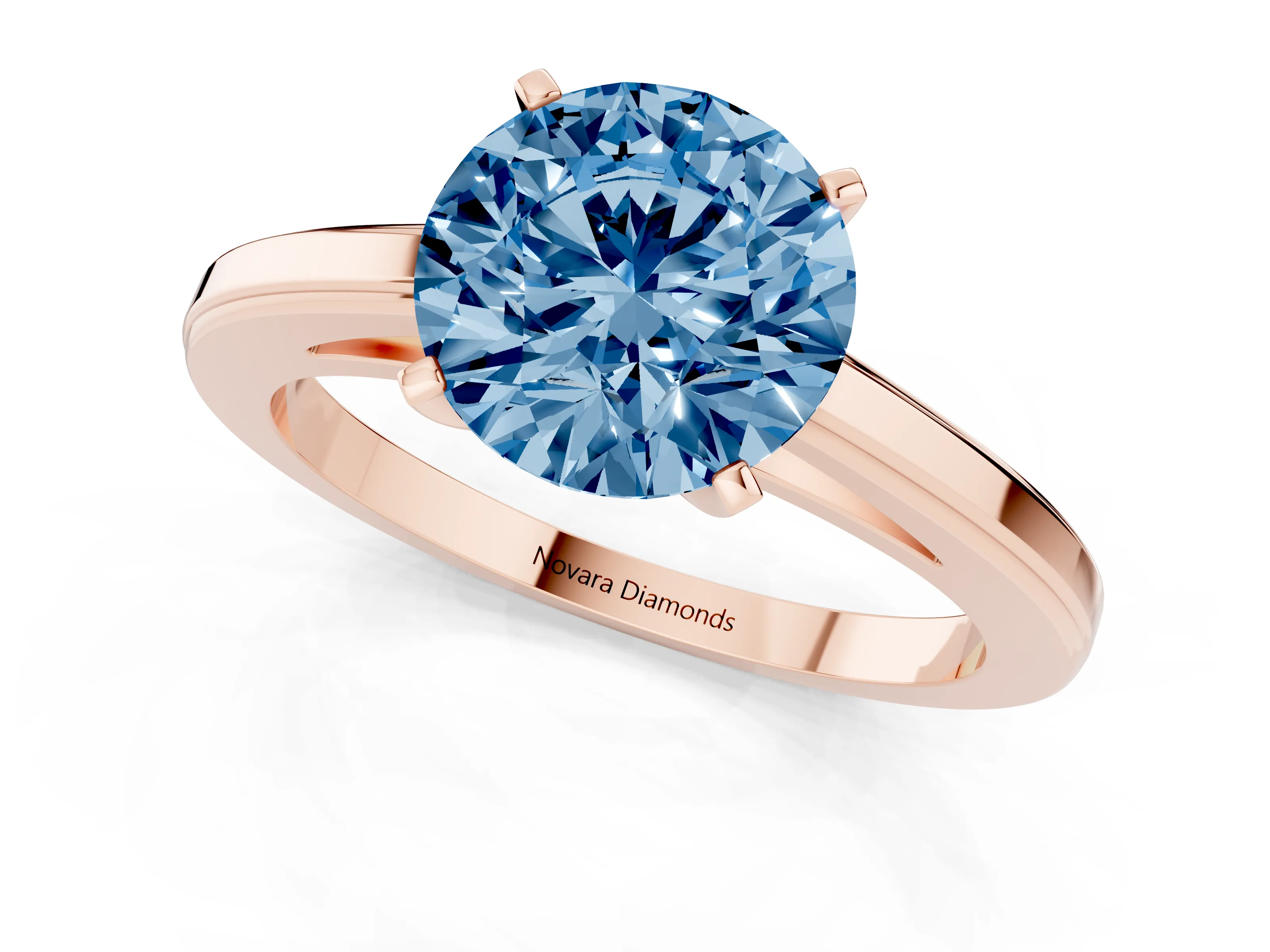 Fancy Blue Round Cut Diamond Solitaire Ring Set in Rose gold with Prong Setting and Classic Band