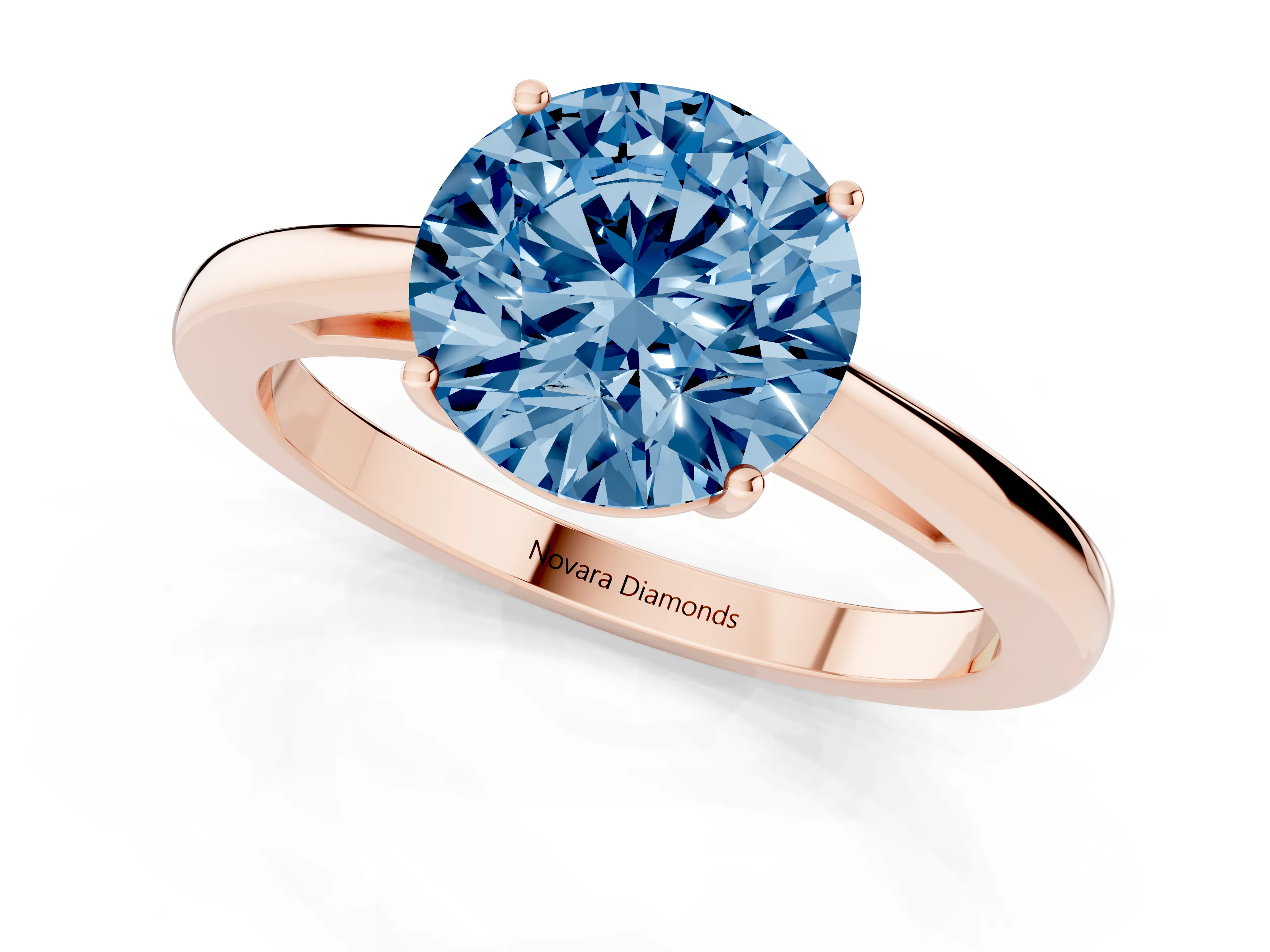 Fancy Blue Round Cut Diamond Solitaire Ring Set in Rose gold with Split Shank and Prong Setting