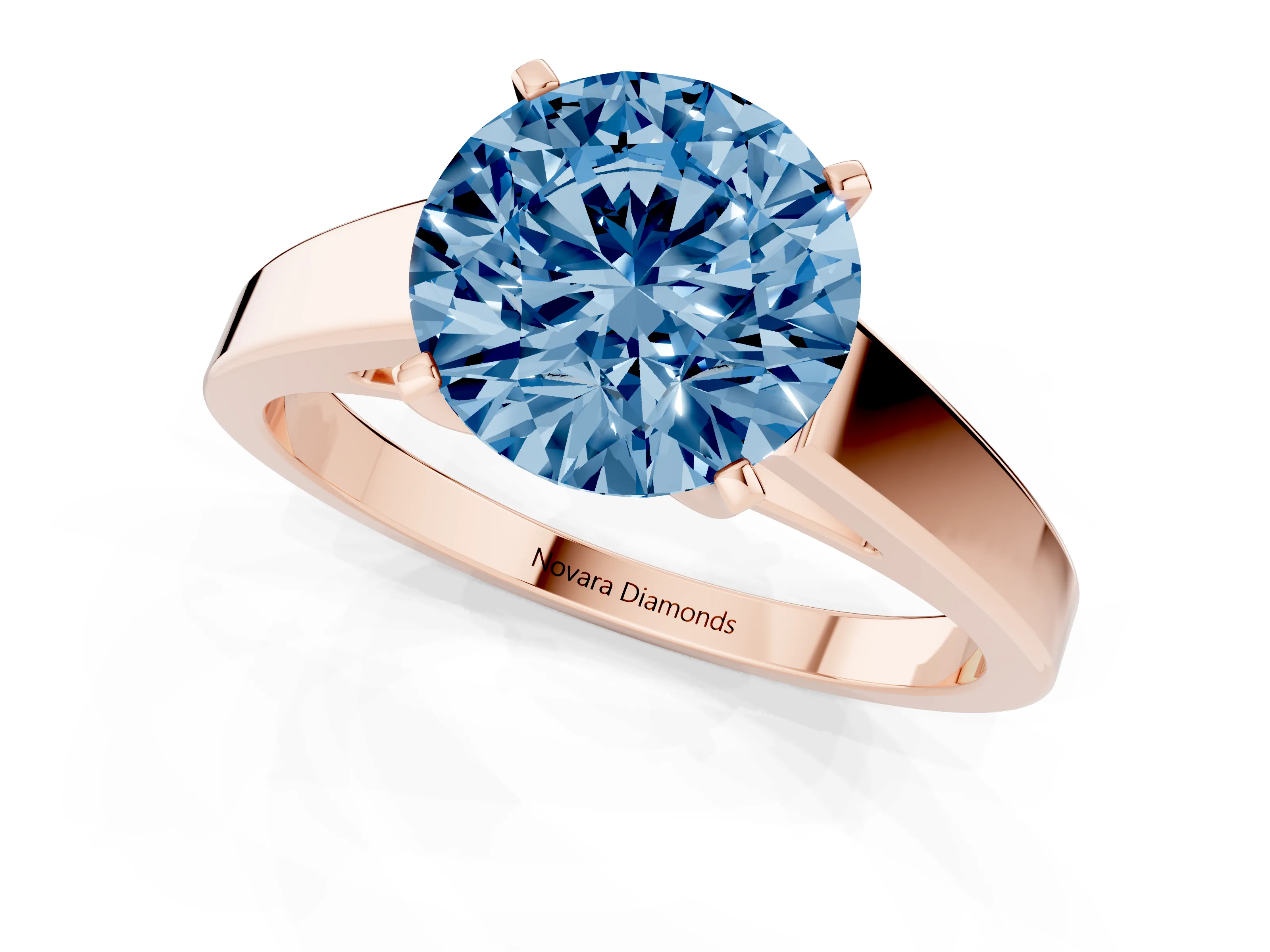 Fancy Blue Round Cut Diamond Solitaire Engagement Ring Set in Rose gold with Prong Setting and Tapered Band