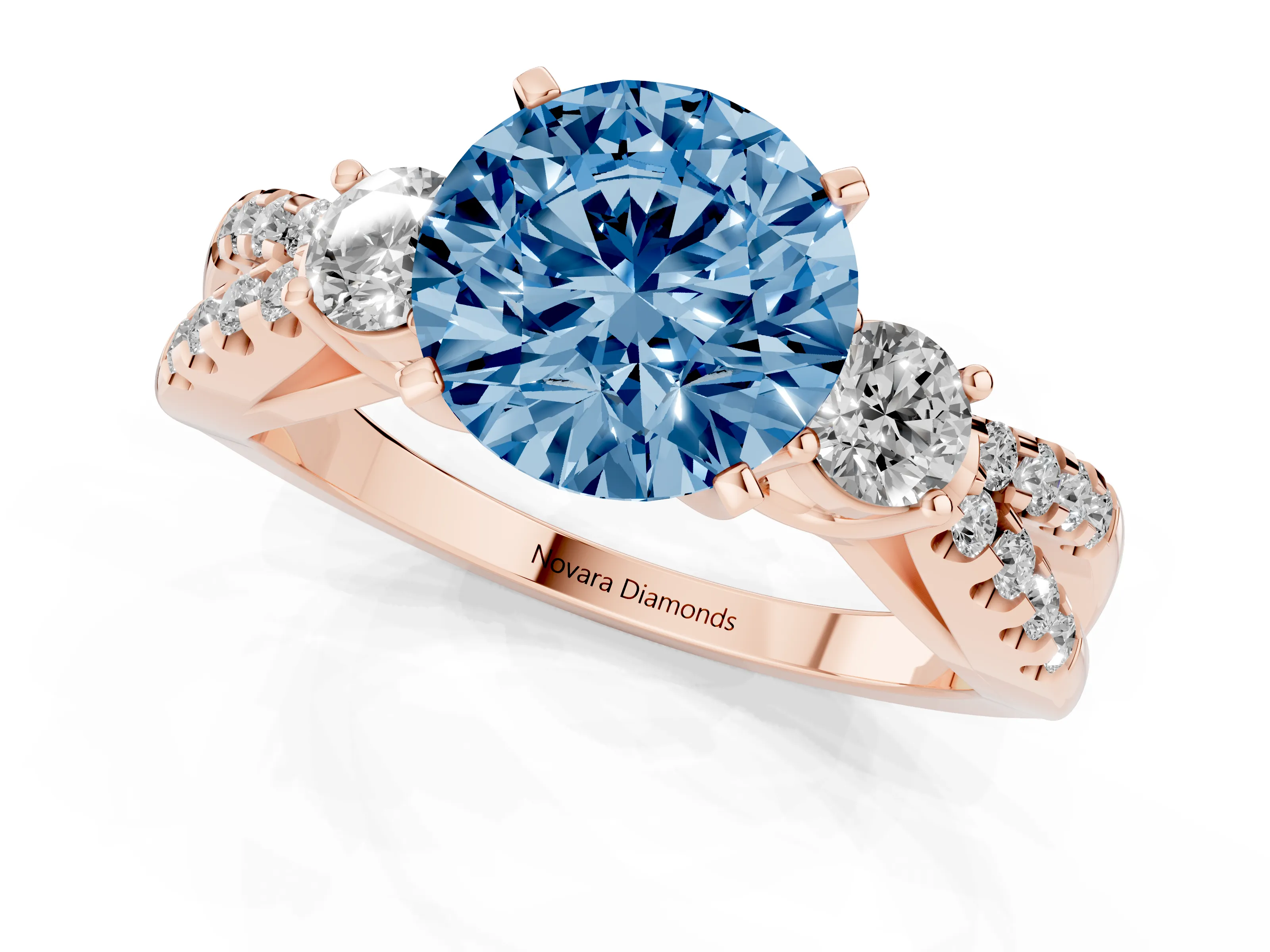 Fancy Blue Round Cut Diamond Three-Stone Ring Set in Rose gold with Pavé Split Shank and Prong Setting