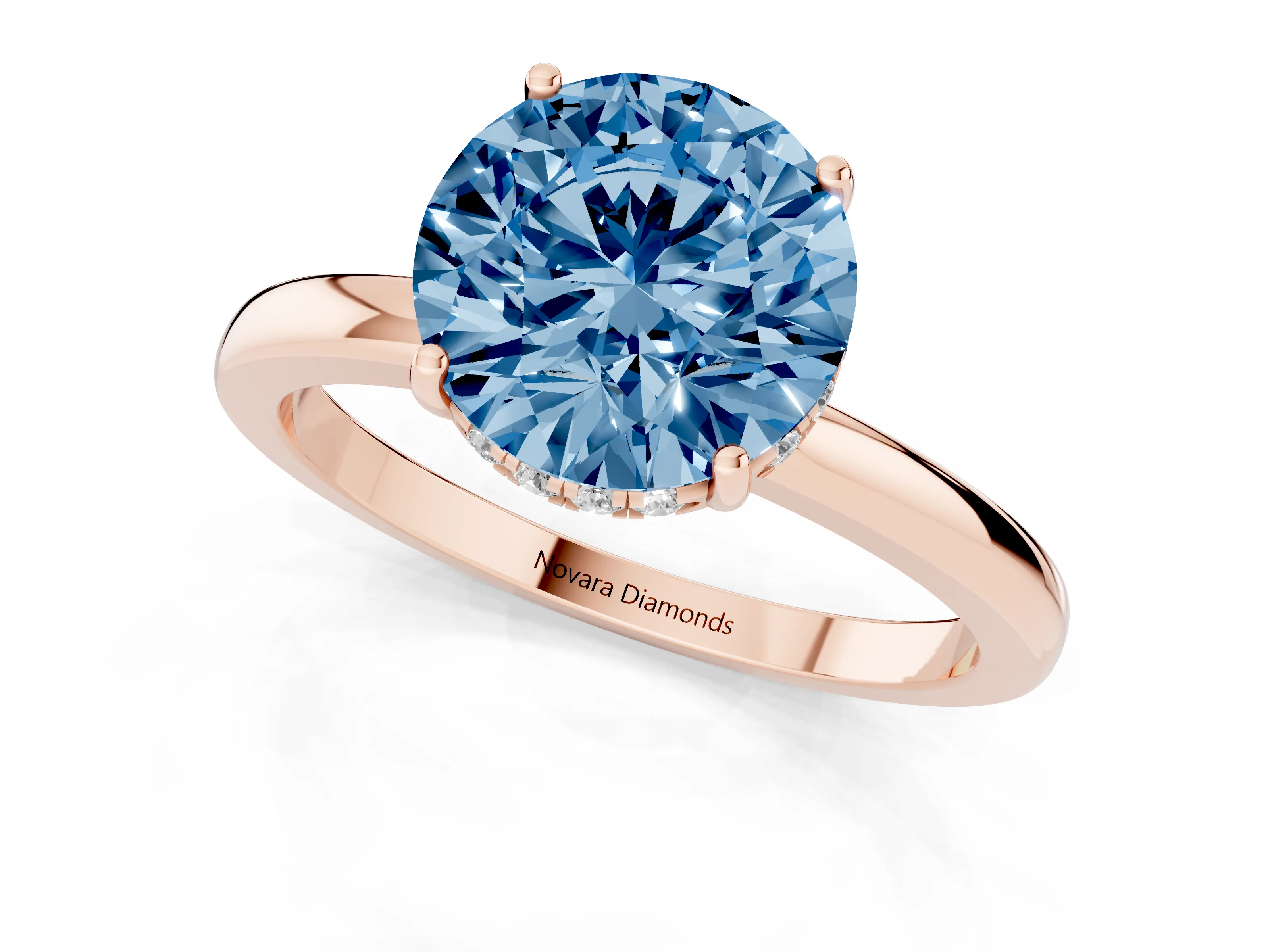 Fancy Blue Round Cut Diamond Solitaire Ring Set in Rose gold with Plain Band and Prong Setting