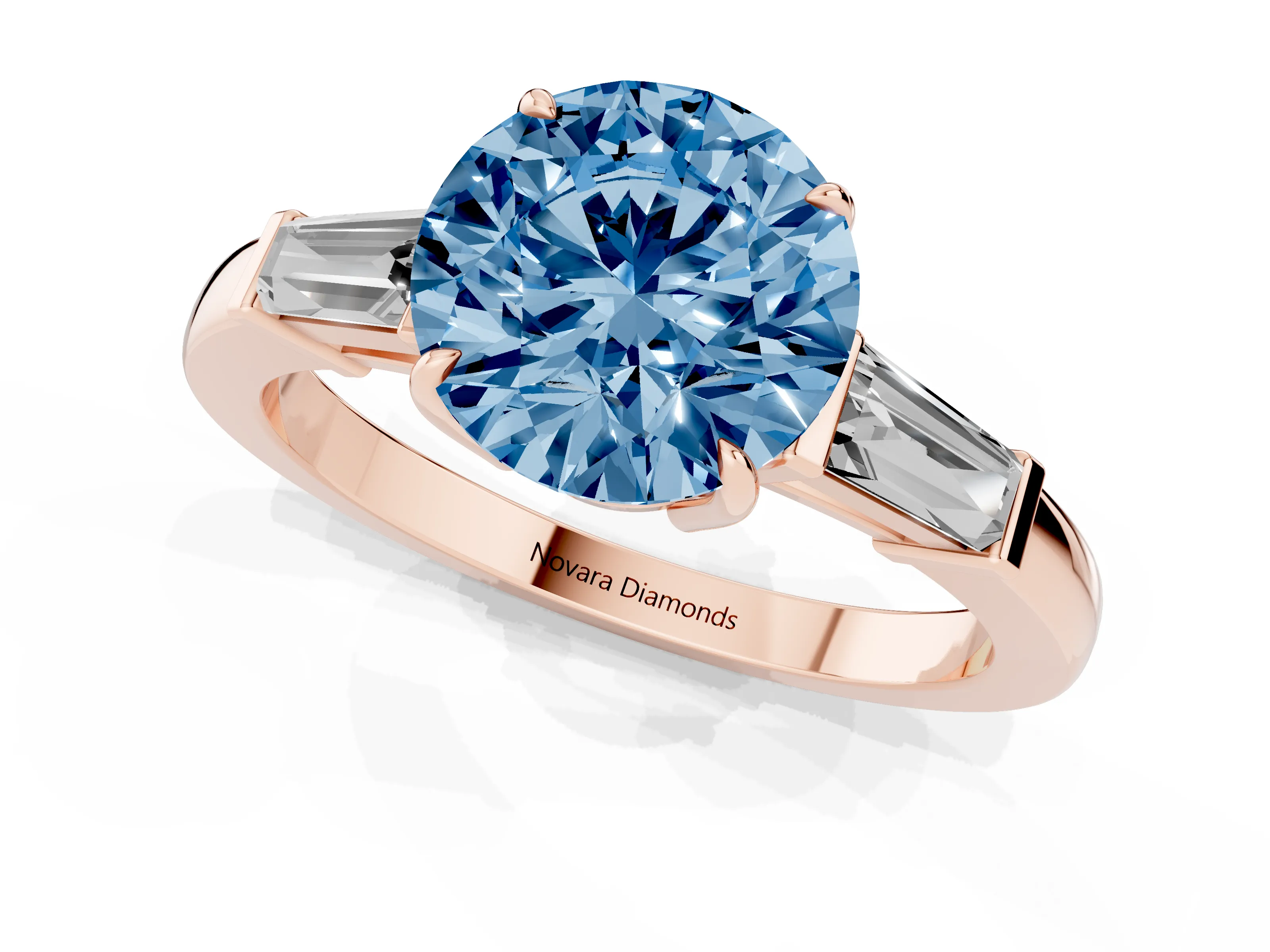 Fancy Blue Round Cut Diamond Three-Stone Ring Set in Rose gold with Tapered Baguette Side Stones and Prong Setting