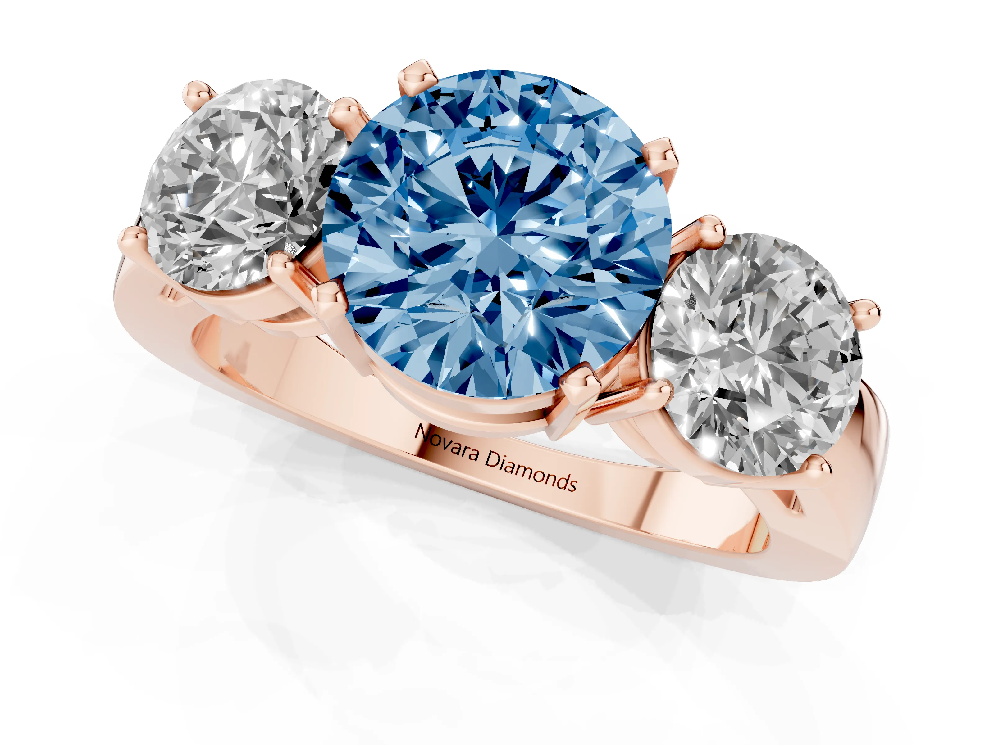 Fancy Blue Round Cut Diamond Three-Stone Ring Set in Rose gold with Round Side Stones and Classic Band