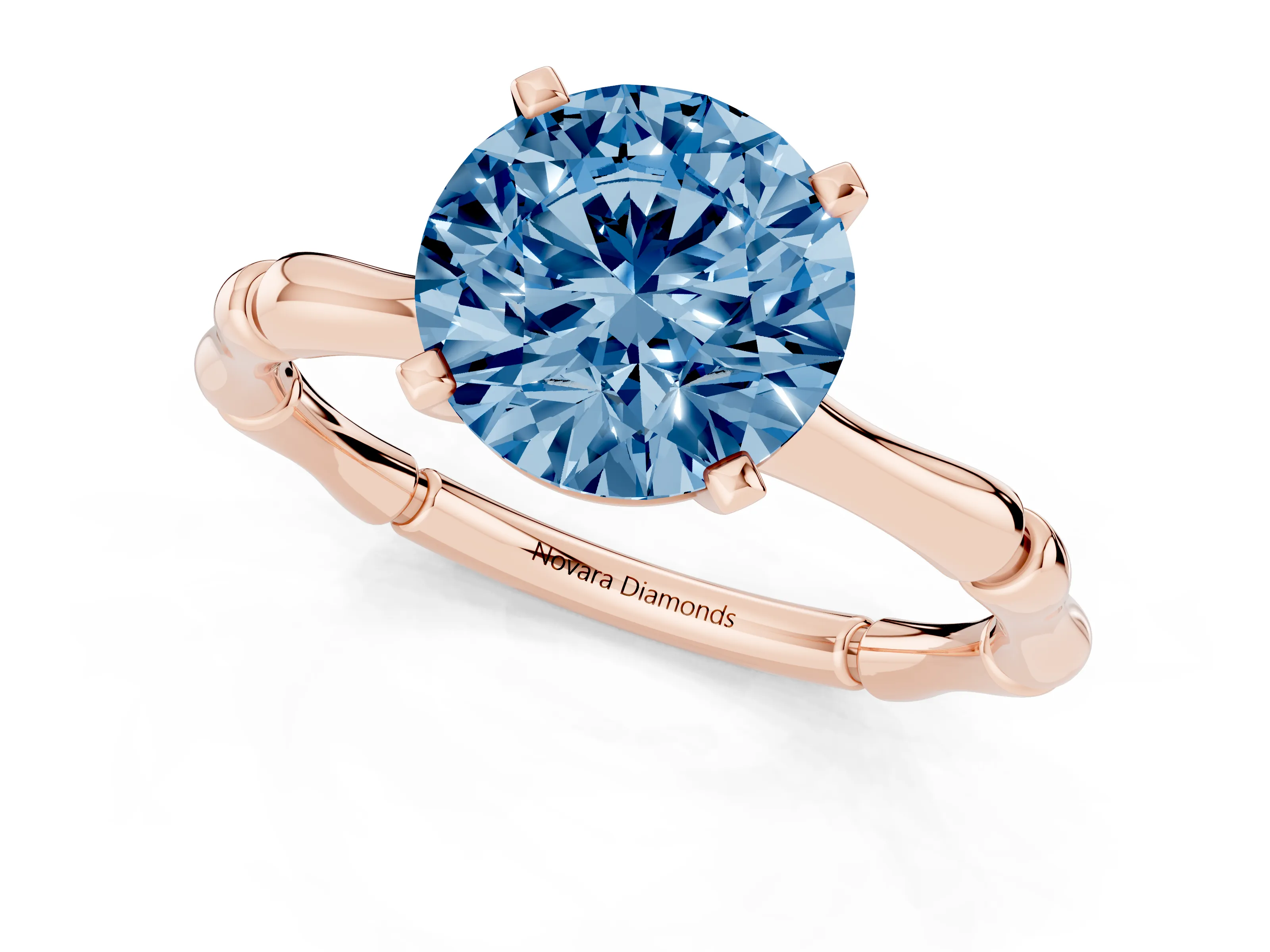 Fancy Blue Round Cut Diamond Solitaire Ring Set in Rose gold with Bamboo Band and Prong Setting
