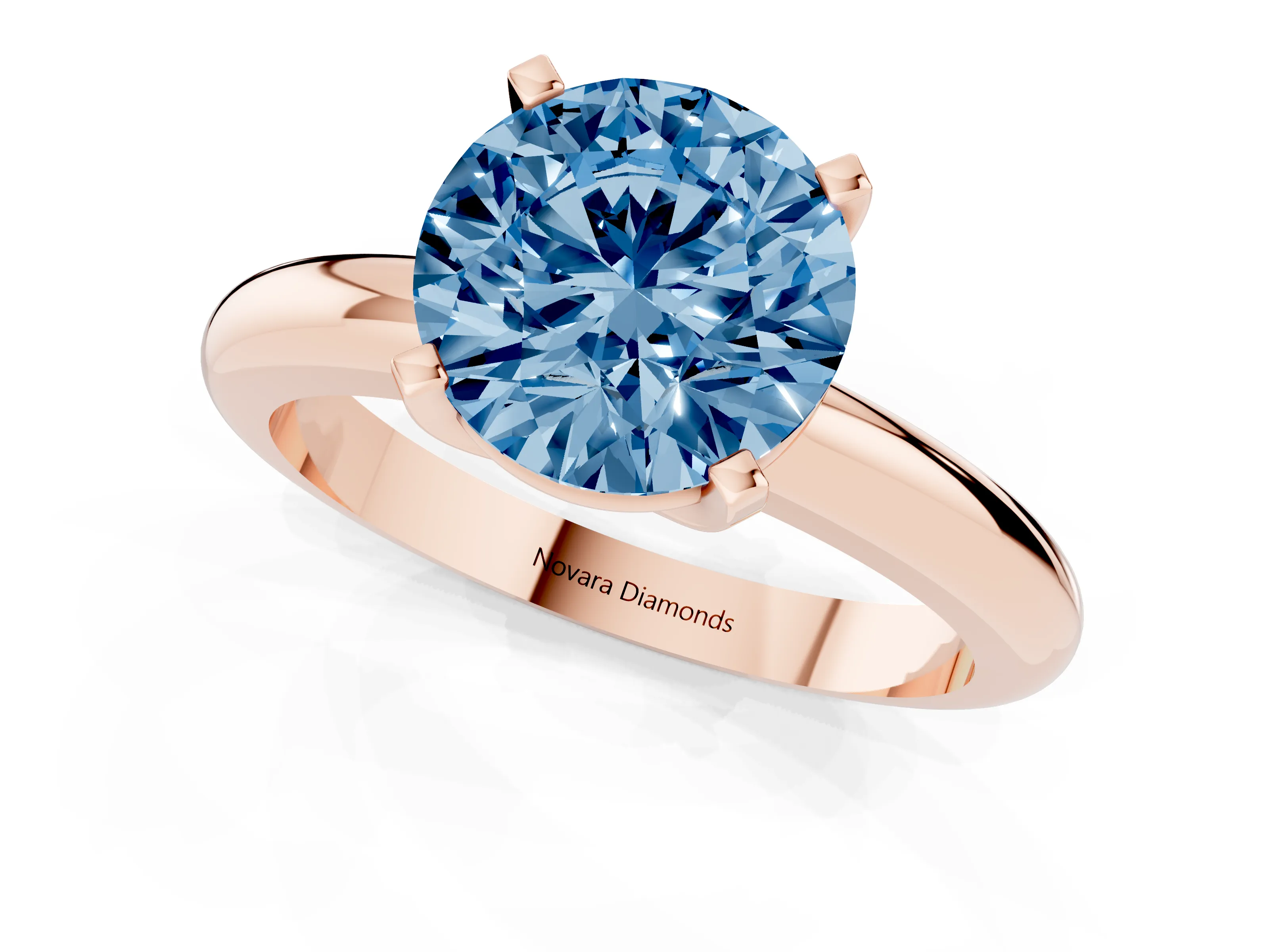 Fancy Blue Round Cut Diamond Solitaire Engagement Ring Set in Rose gold with Round Band and Prong Setting