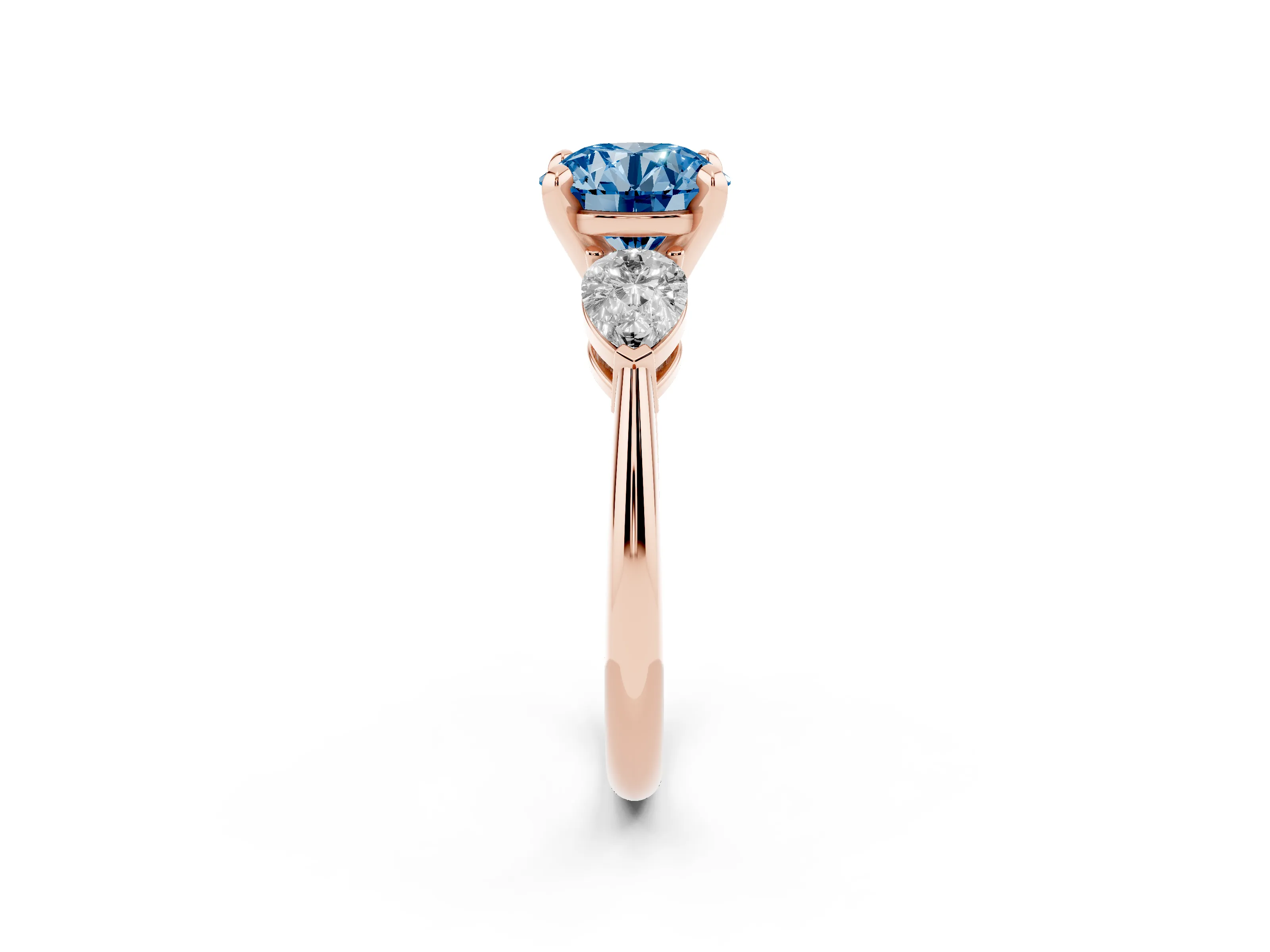 Fancy Blue Three-Stone Round Cut Diamond Ring Set in Rose gold with Pear Side Stones and Prong Setting