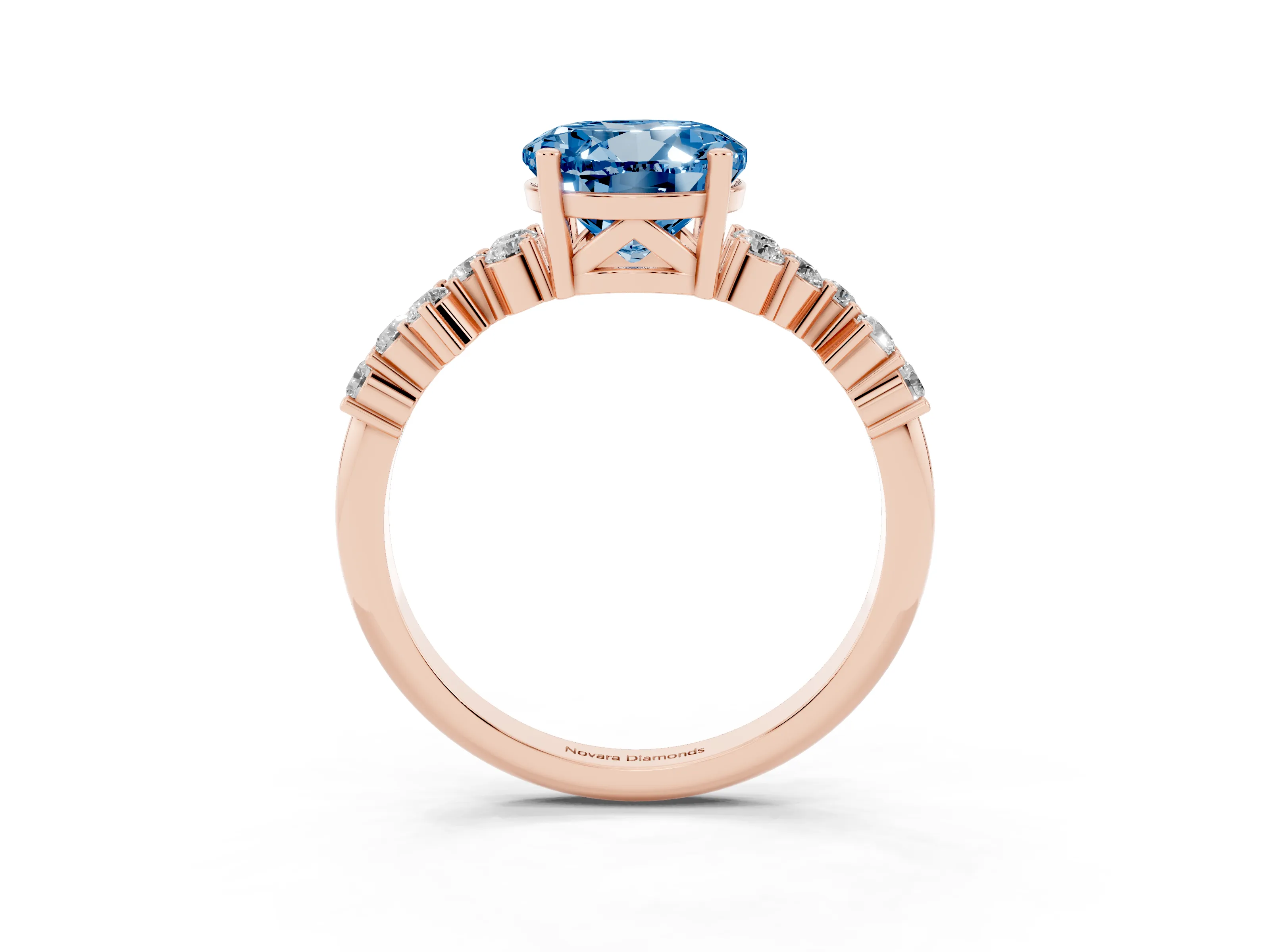 Fancy Blue Round Cut Diamond Ring Set in Rose gold with Scattered Round Accents