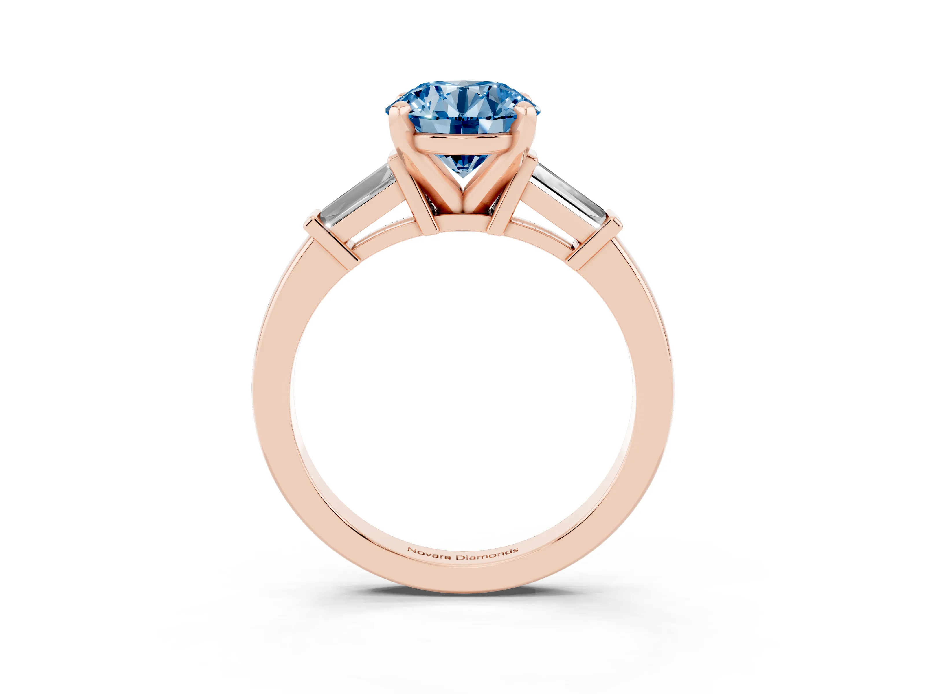 Fancy Blue Round Cut Diamond Solitaire Ring Set in Rose gold with Tapered Baguette Accents and Prong Setting