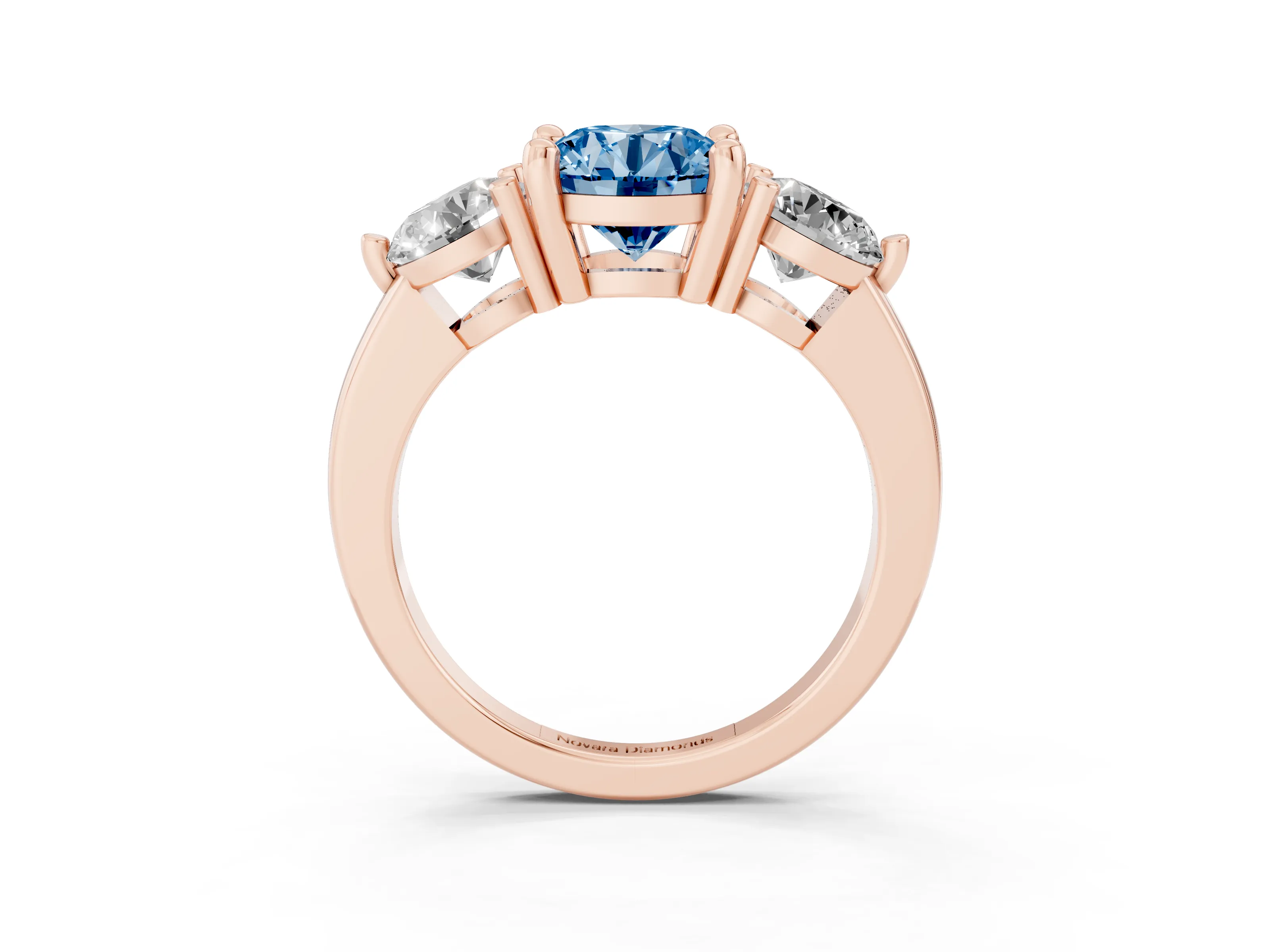 Fancy Blue Round Cut Diamond Three-Stone Ring Set in Rose gold with Prong Setting and Classic Band
