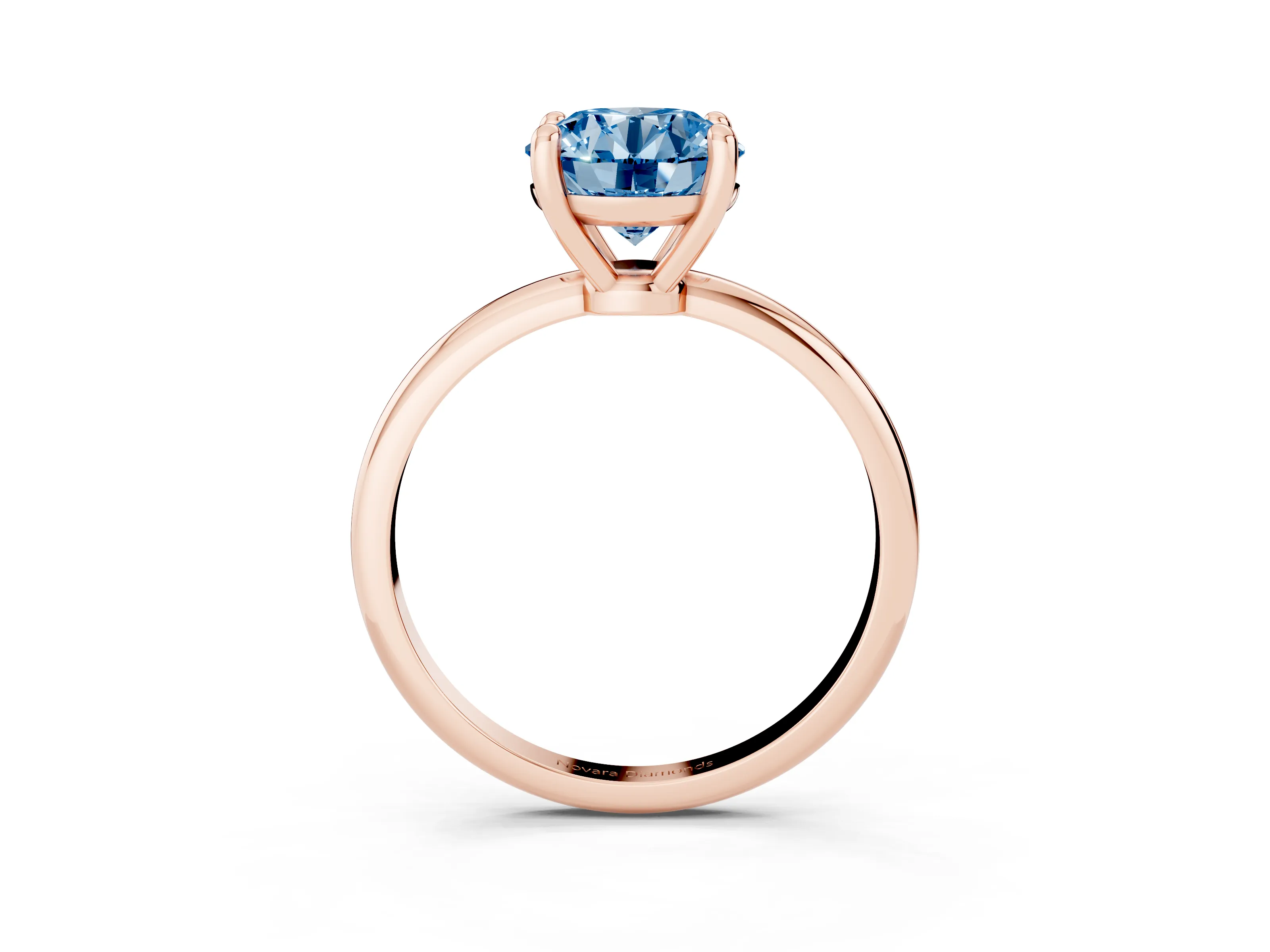 Fancy Blue Round Cut Diamond Solitaire Ring Set in Rose gold with Secure Prong Setting on a Classic Band
