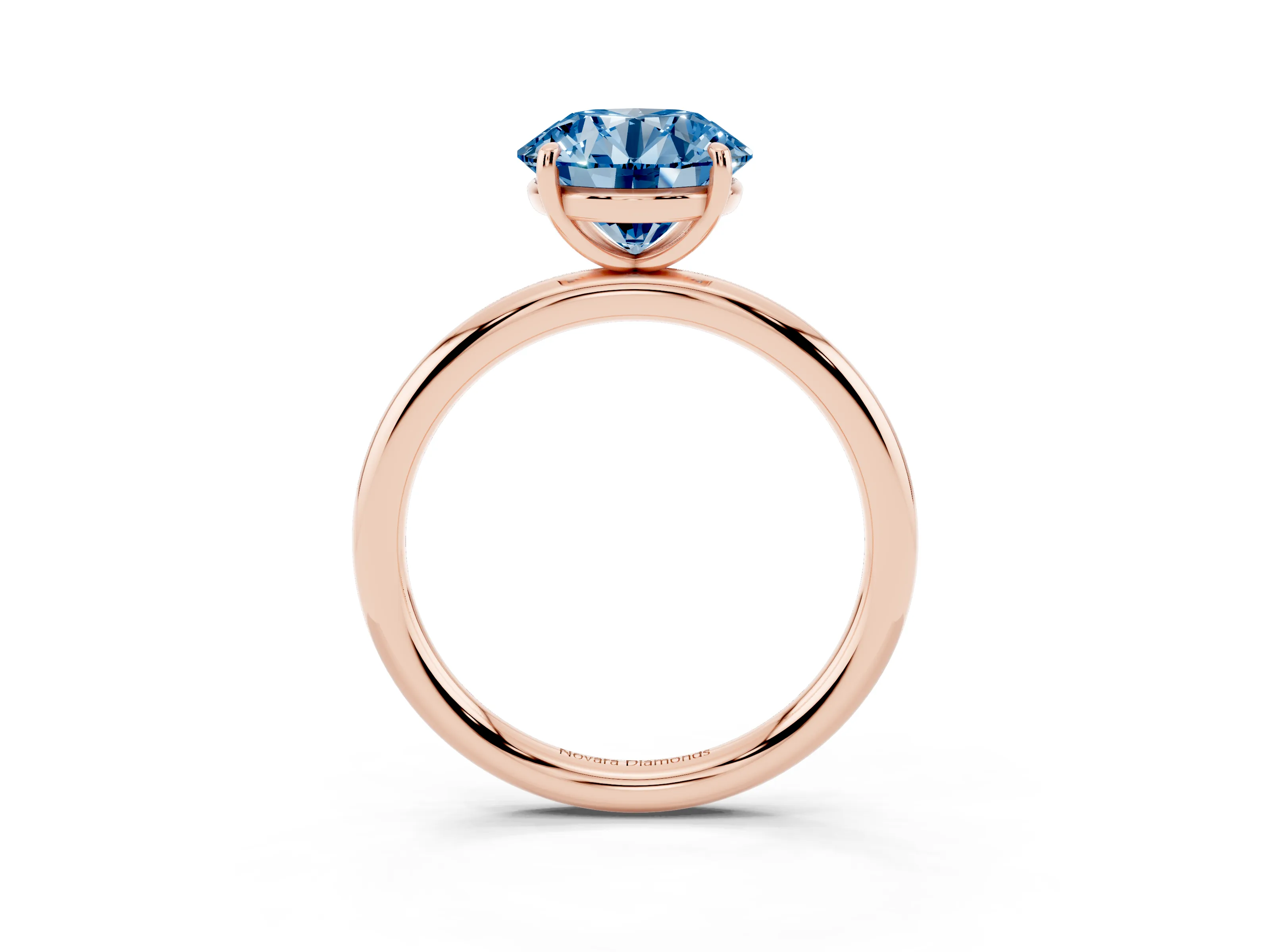Fancy Blue Round Cut Diamond Solitaire Ring Set in Rose gold with Prong Setting on a Polished Plain Band