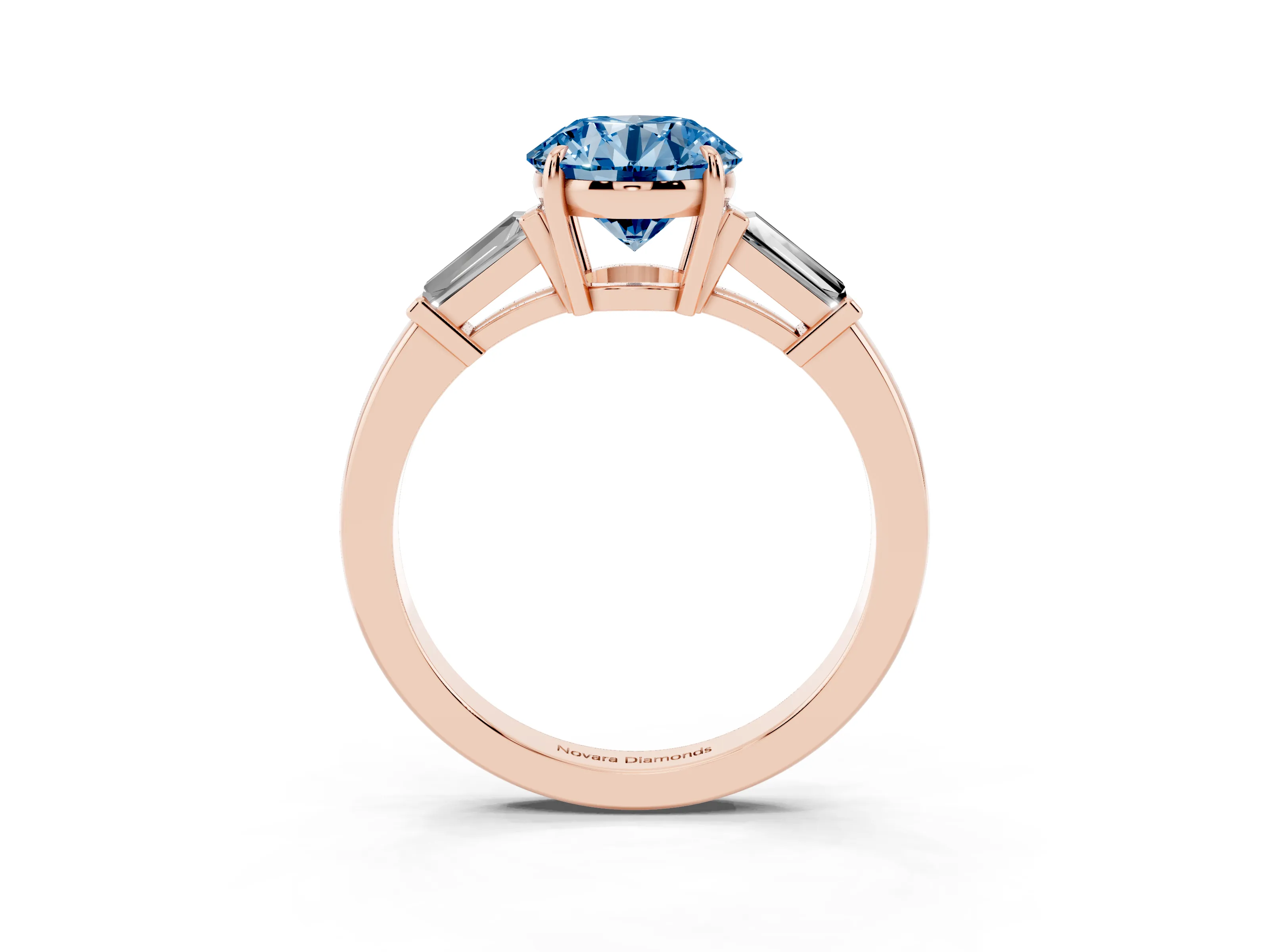 Fancy Blue Round Cut Diamond Three-Stone Ring Set in Rose gold with Tapered Baguette Side Stones and Prong Setting