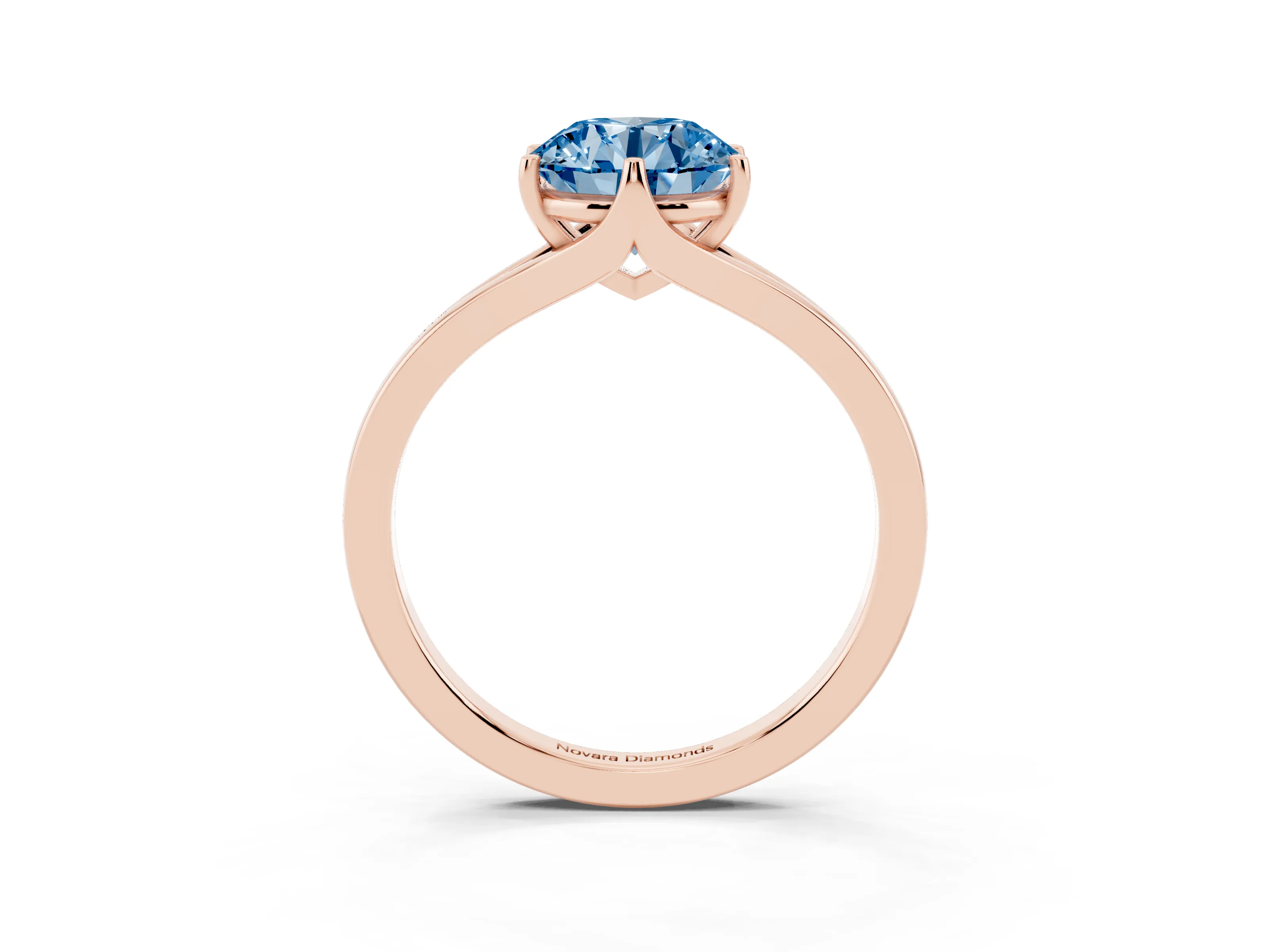 Fancy Blue Round Cut Diamond Solitaire Ring Set in Rose gold with Polished Tapered Band and Prong Setting