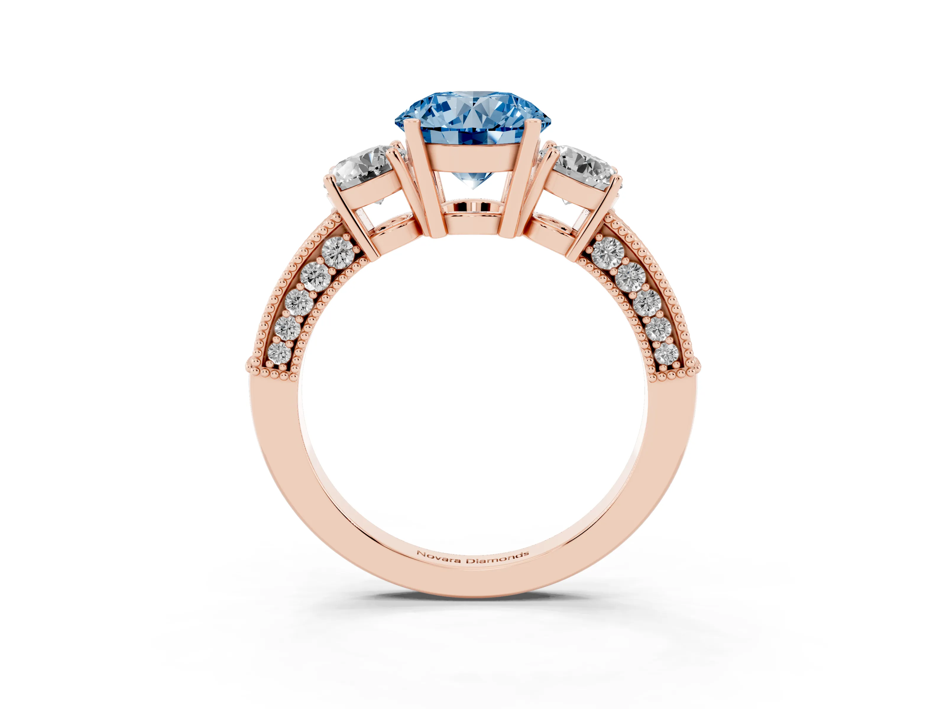 Fancy Blue Round Cut Diamond Three-Stone Ring Set in Rose gold with Round Side Stones and Pavé Band