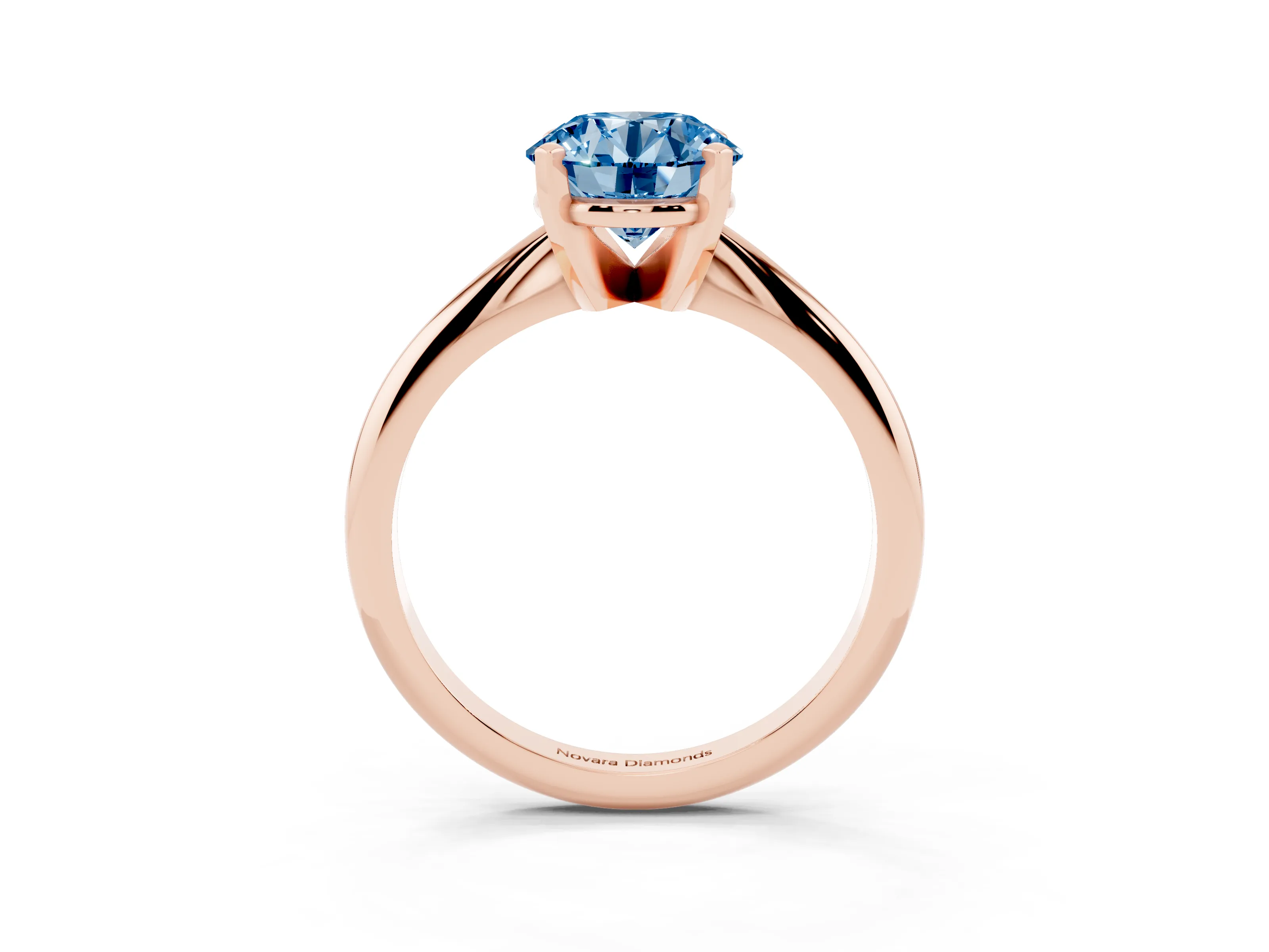 Fancy Blue Round Cut Diamond Solitaire Ring Set in Rose gold with Prong Setting on a Plain Round Band