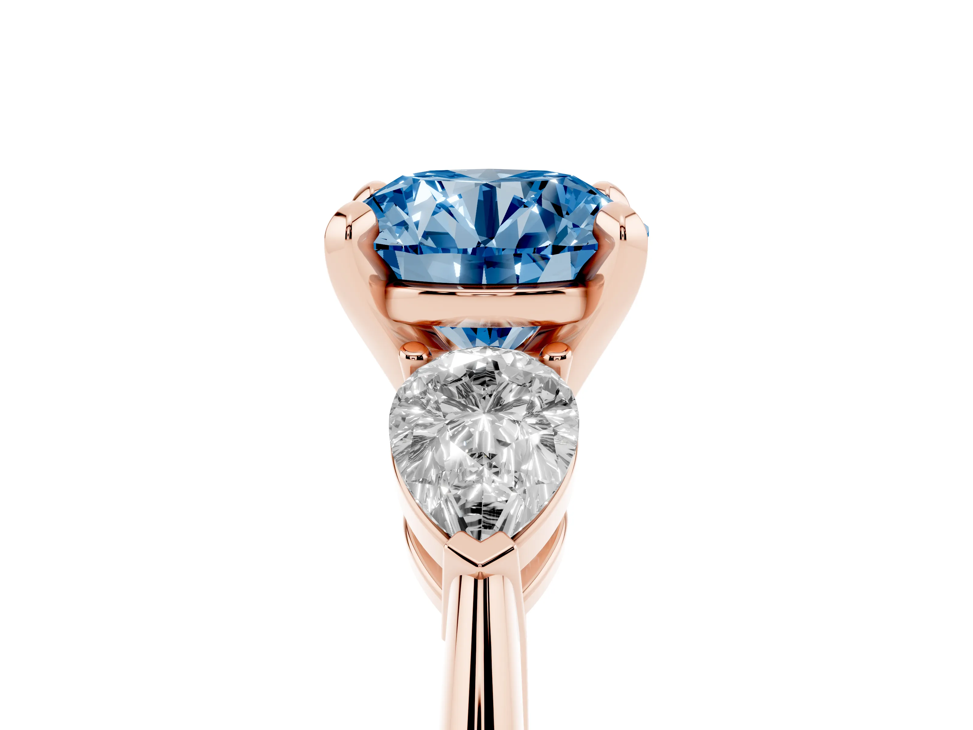 Fancy Blue Three-Stone Round Cut Diamond Ring Set in Rose gold with Pear Side Stones and Prong Setting