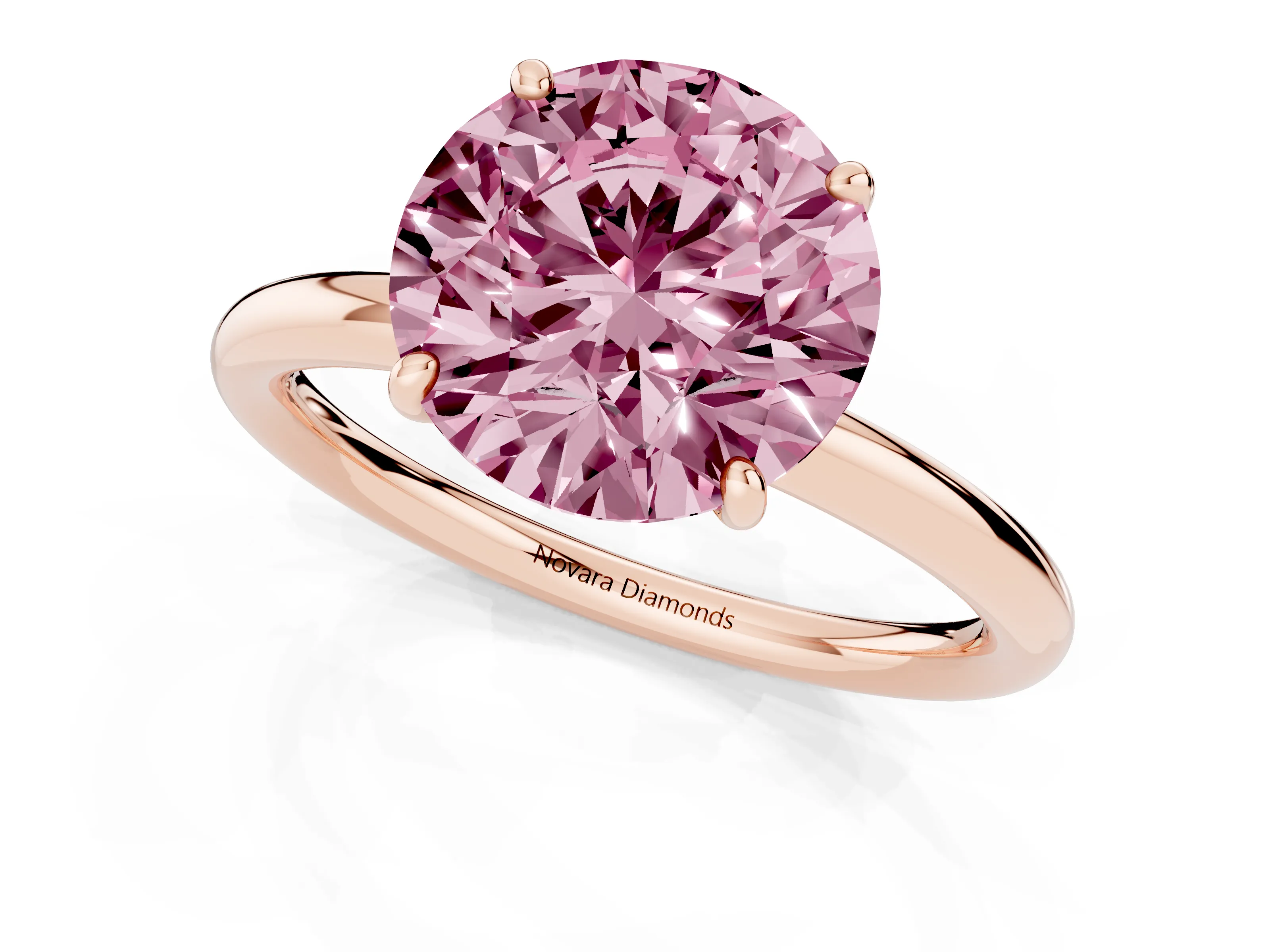 Fancy Pink Round Cut Diamond Solitaire Ring Set in Rose gold with Prong Setting on a Polished Plain Band