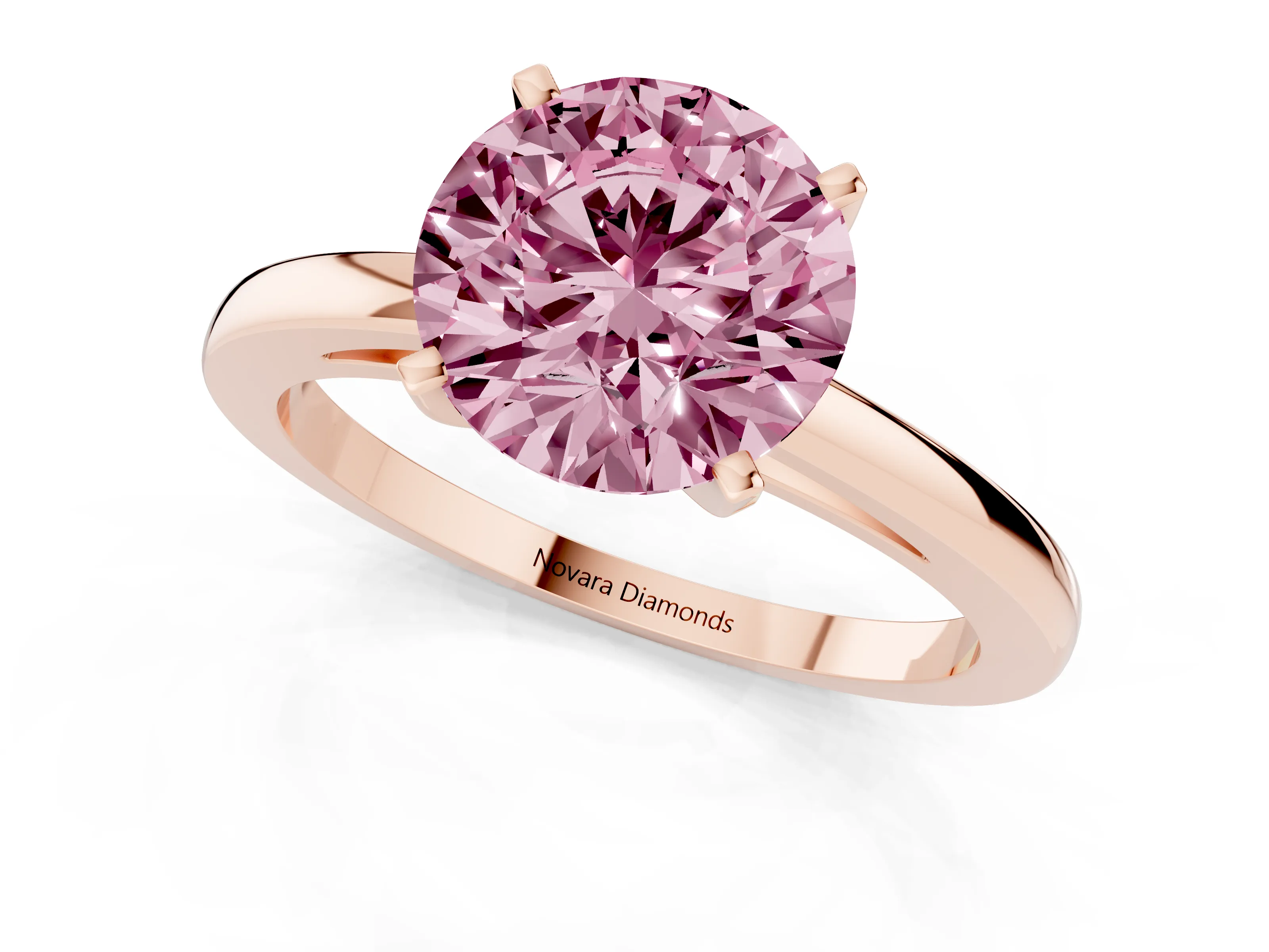 Fancy Pink Round Cut Diamond Solitaire Engagement Ring Set in Rose gold with Prong Setting on a Classic Band