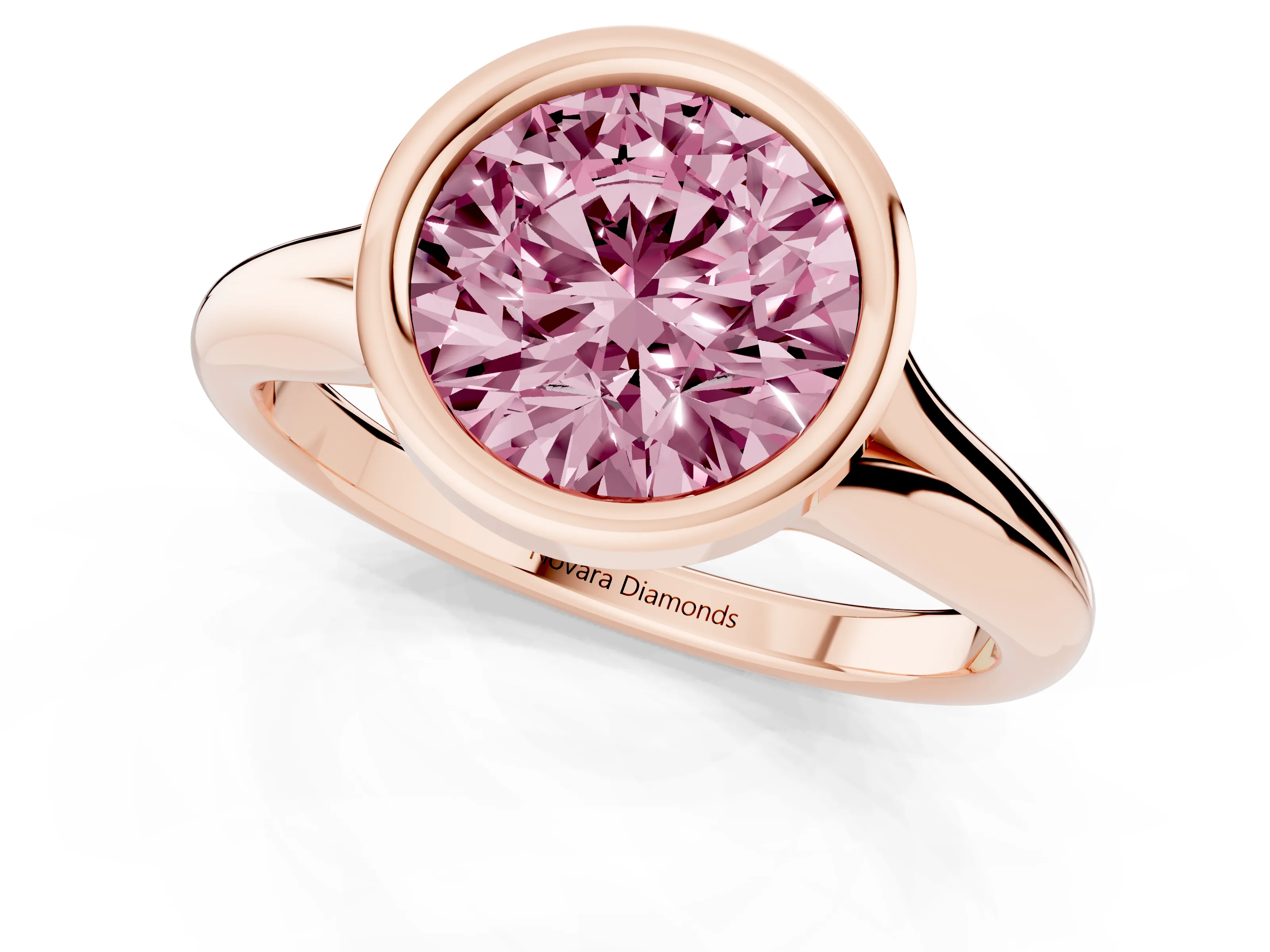 Fancy Pink Bezel Set Round Cut Diamond Solitaire Ring Set in Rose gold with Smooth Band