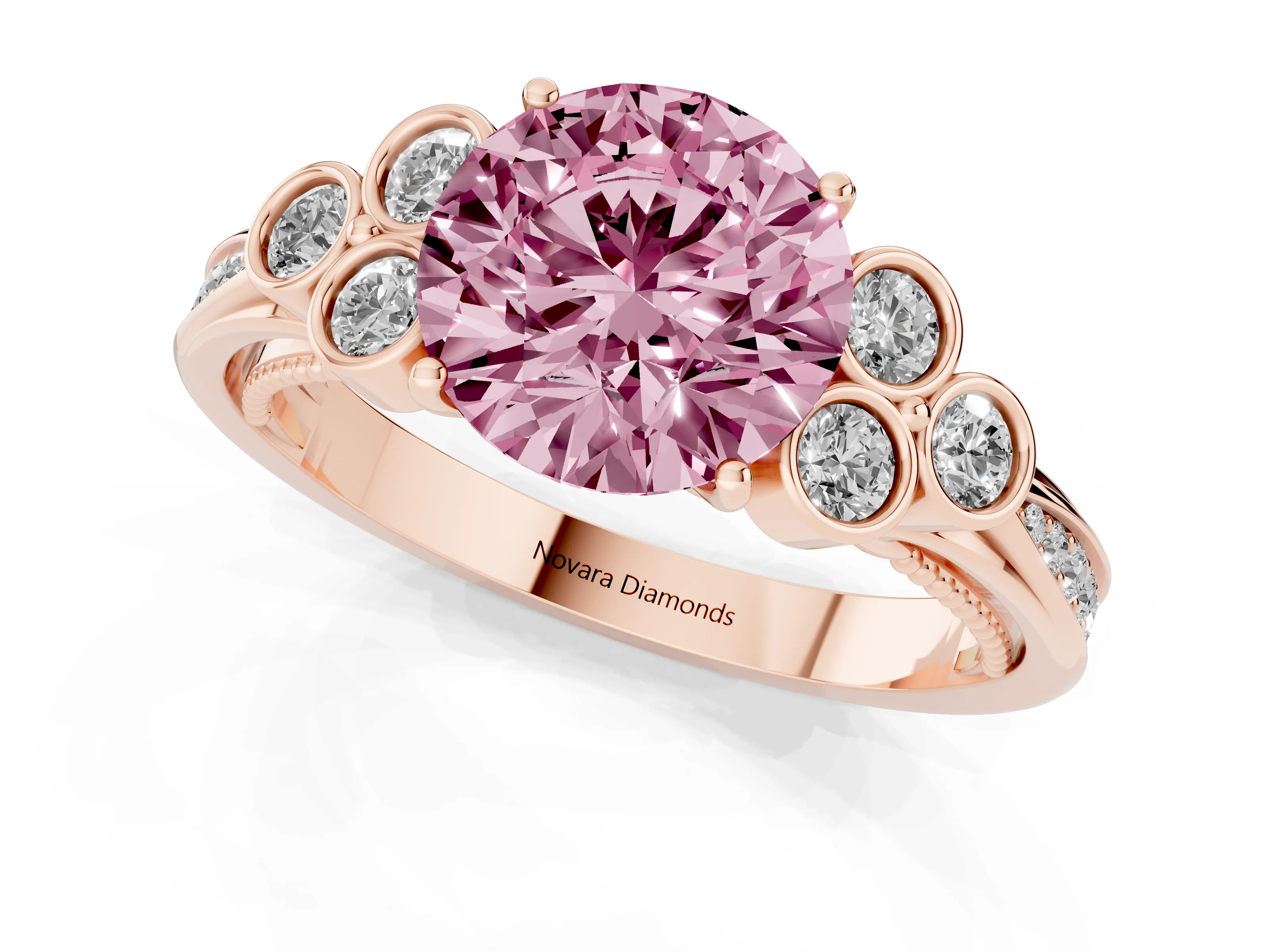 Fancy Pink Round Cut Diamond Engagement Ring Set in Rose gold with Bezel Set Round Side Stones and Prong Setting