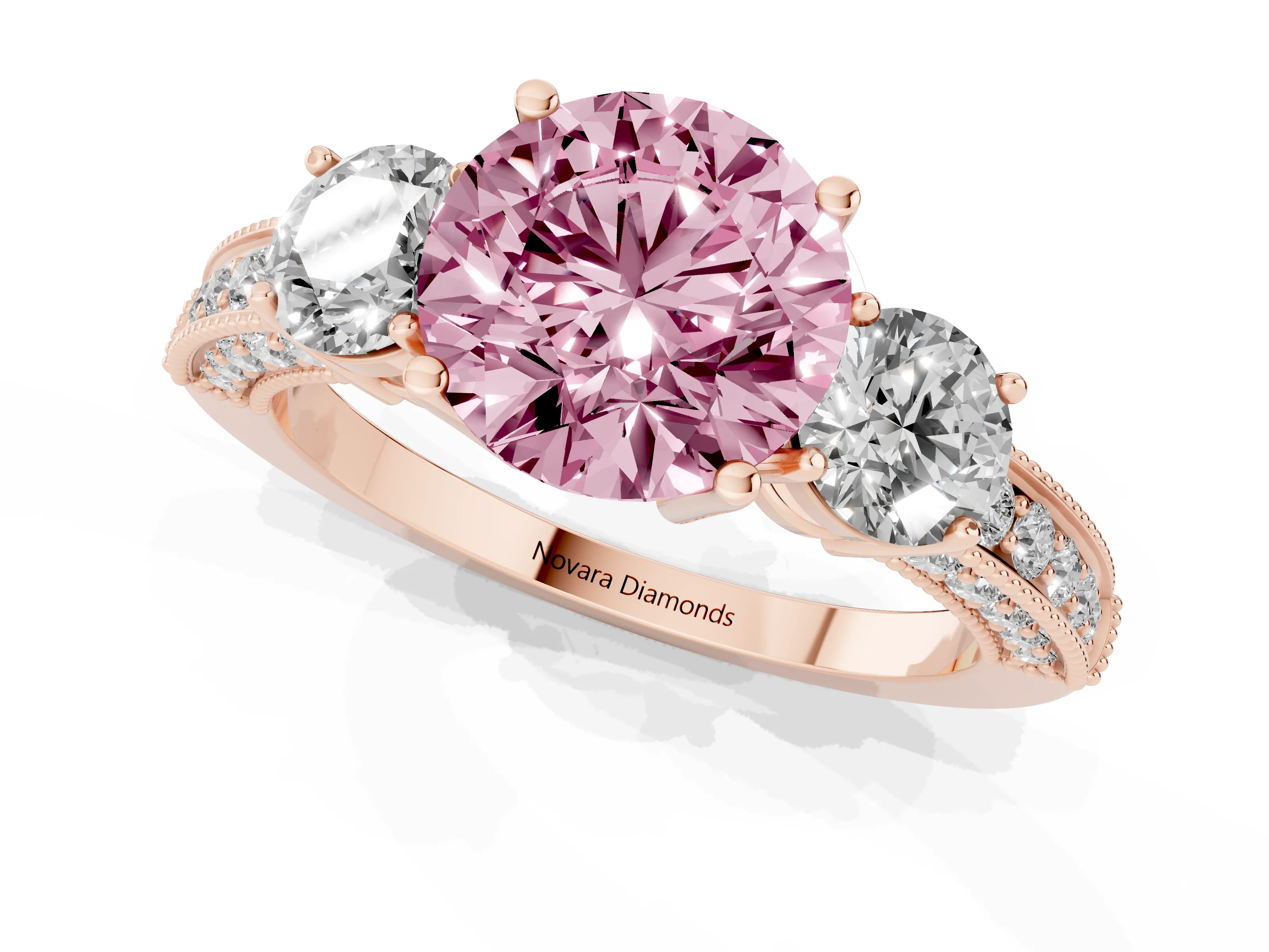 Fancy Pink Round Cut Diamond Three-Stone Ring Set in Rose gold with Round Side Stones and Pavé Band