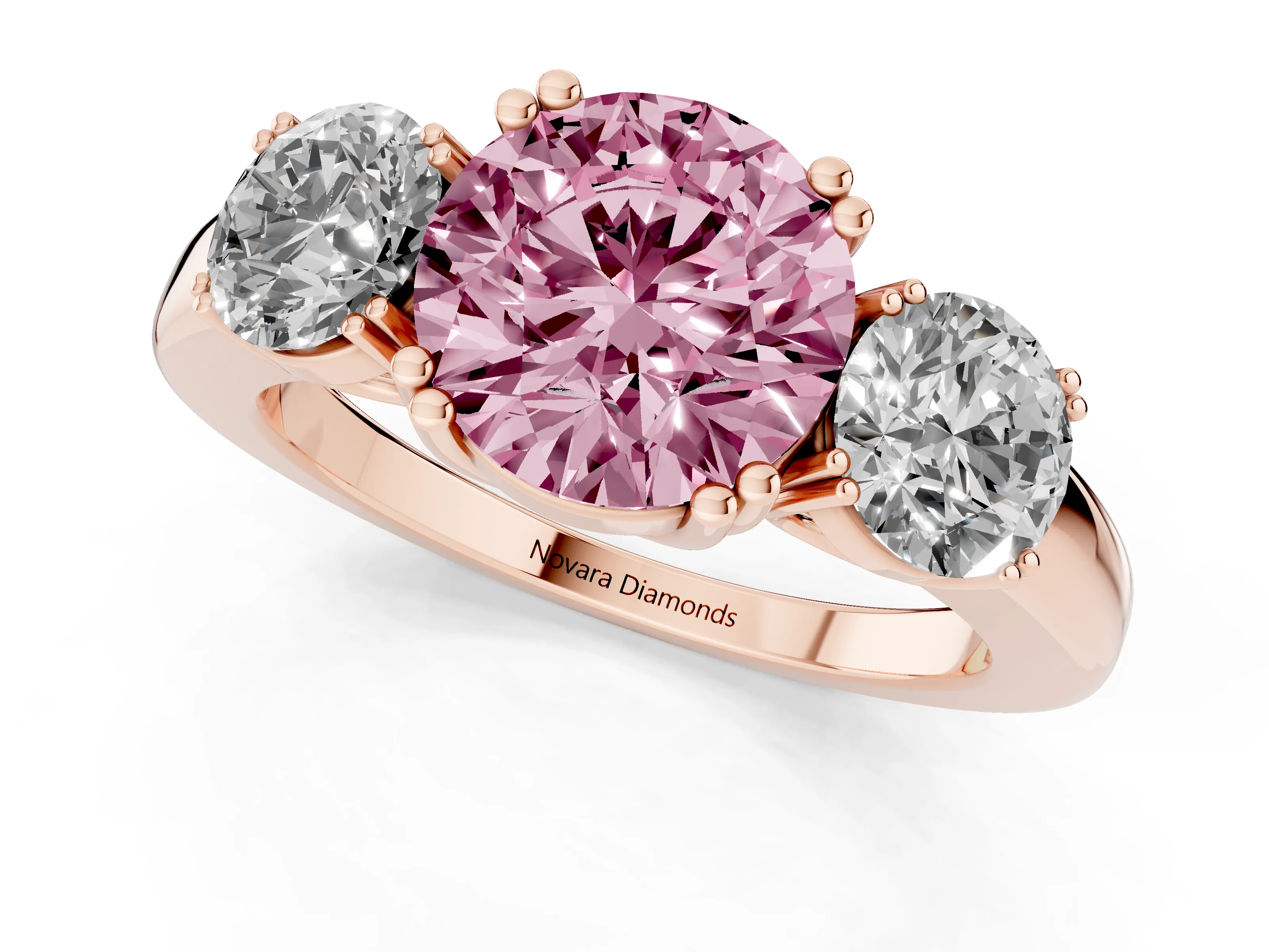 Fancy Pink Round Cut Diamond Three-Stone Ring Set in Rose gold with Polished Channel-Set Band