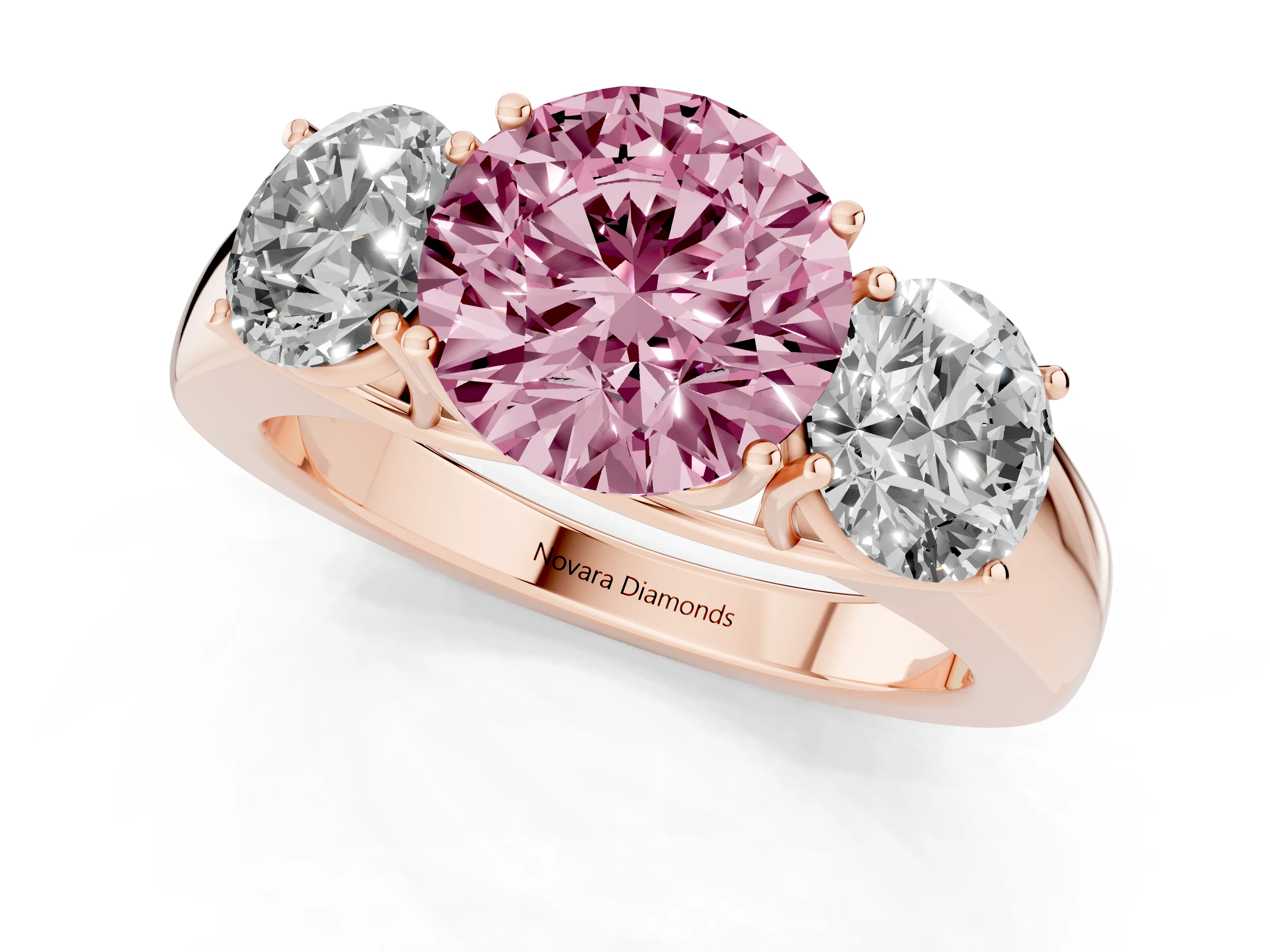 Fancy Pink Three-Stone Round Cut Diamond Ring Set in Rose gold with Matching Prong Settings and Plain Band