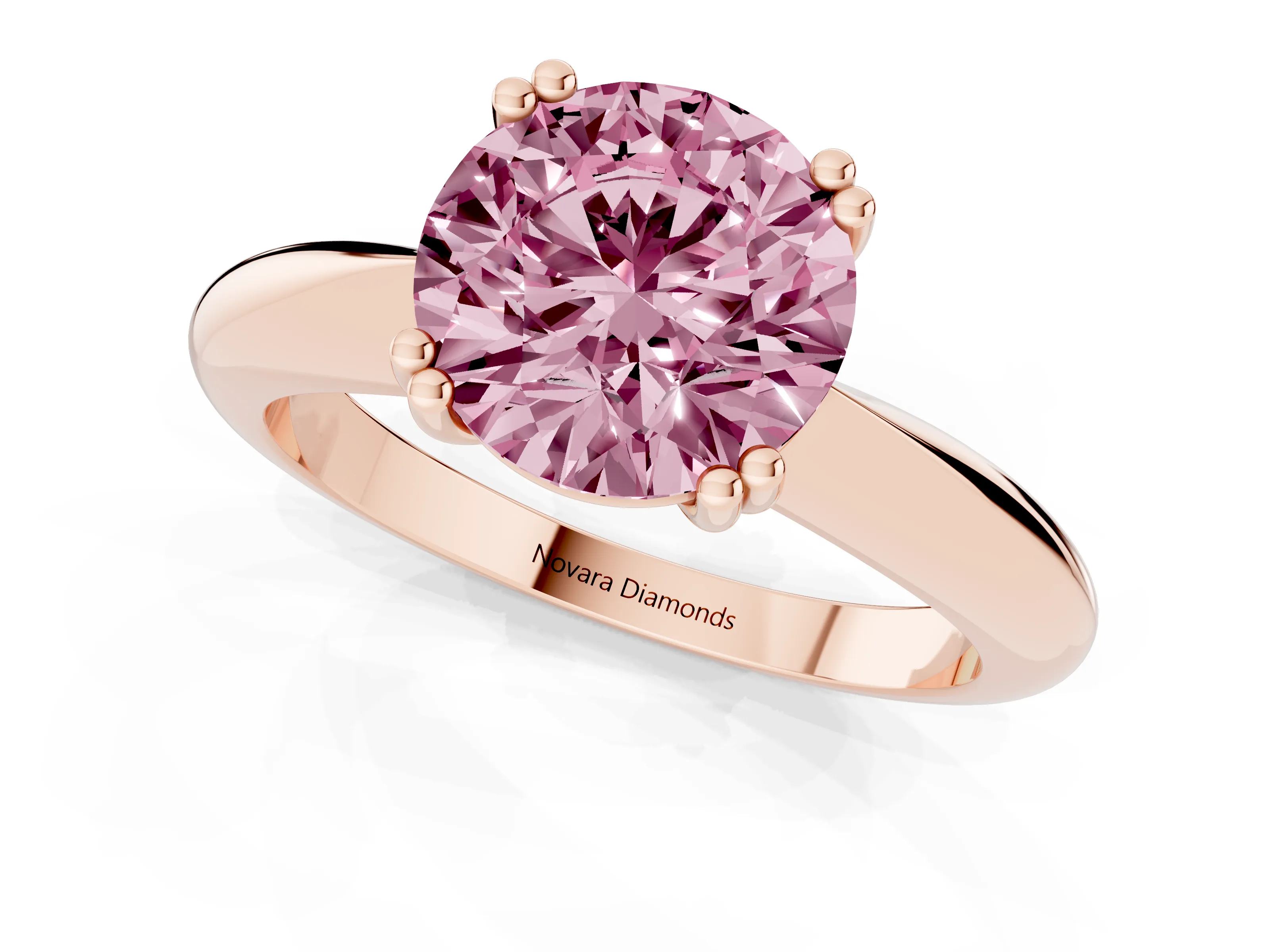 Fancy Pink Round Cut Diamond Solitaire Engagement Ring Set in Rose gold with Tapered Band and Prong Setting