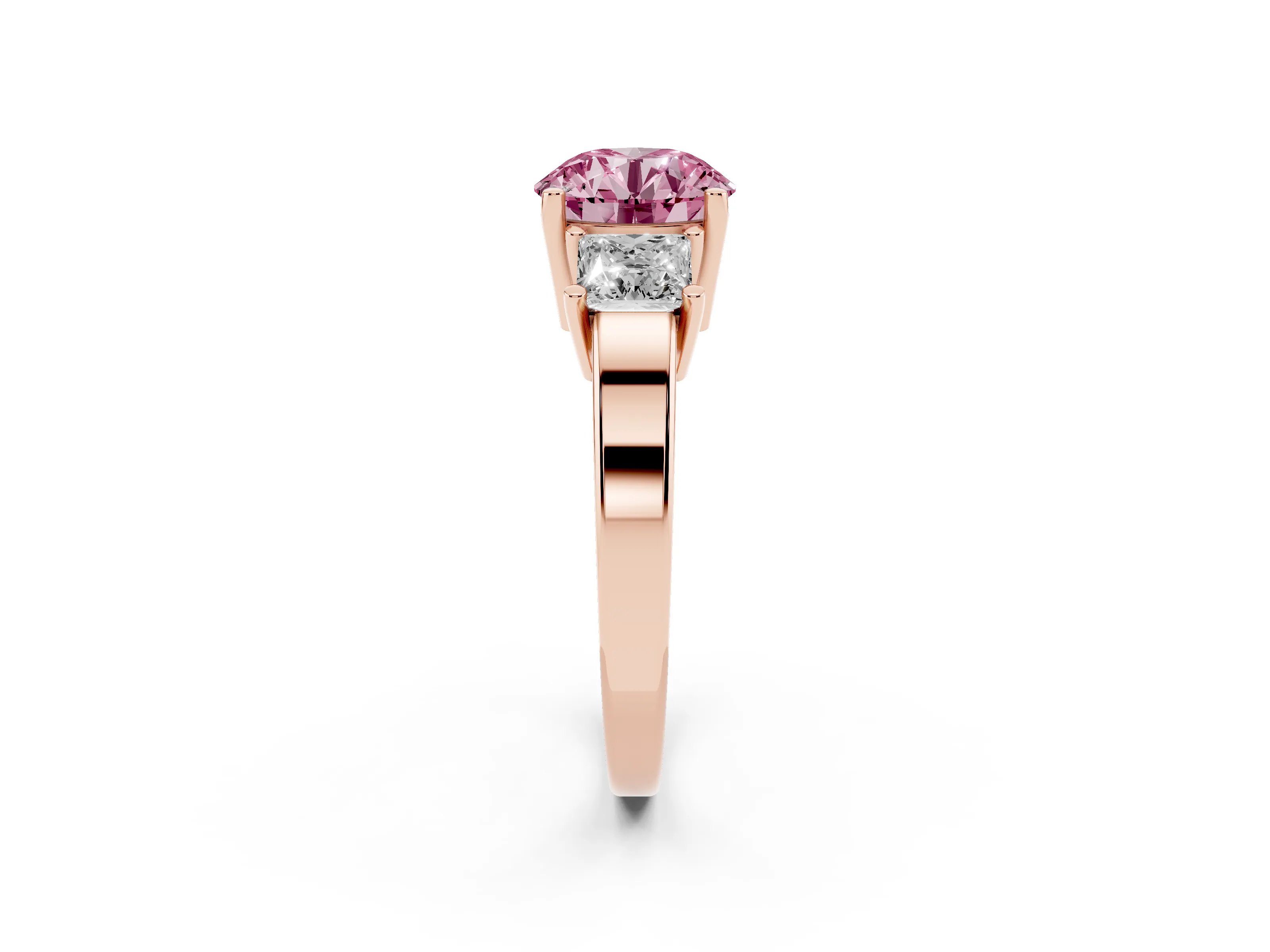 Fancy Pink Three-Stone Round Cut Diamond Solitaire Ring Set in Rose gold with Prong Setting