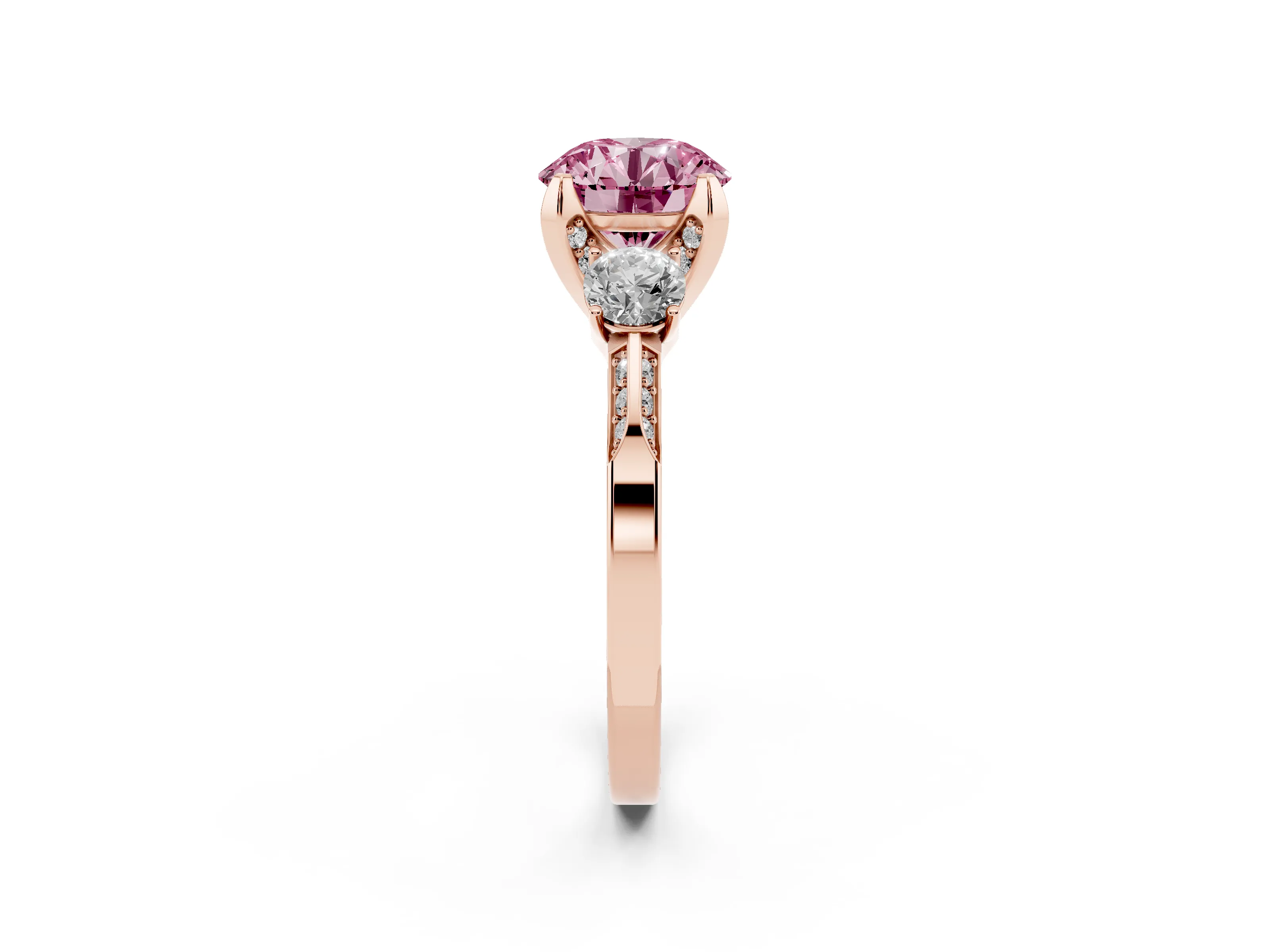Fancy Pink Round Cut Diamond Three-Stone Ring Set in Rose gold with Pavé Band and Smaller Side Stones