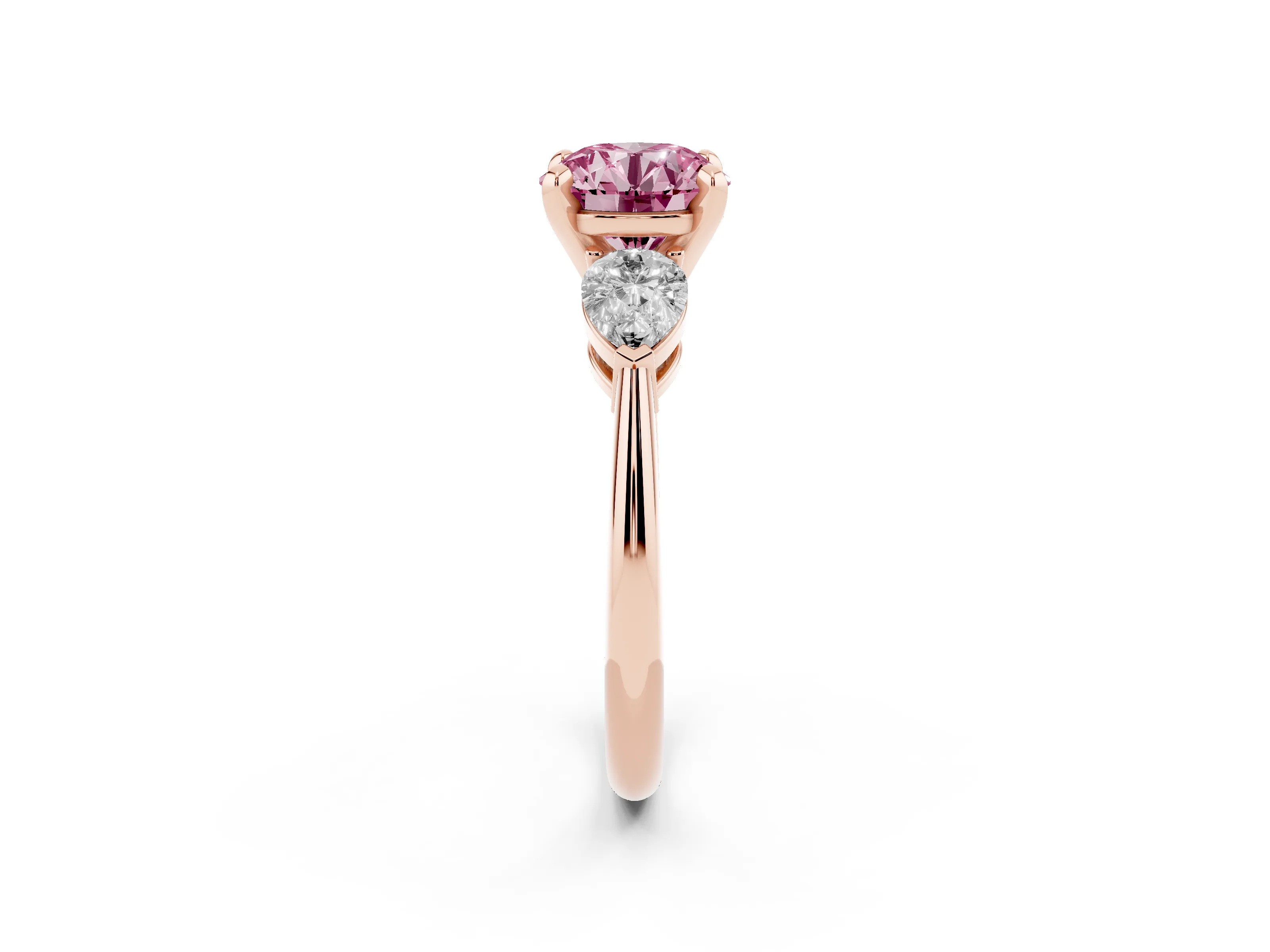 Fancy Pink Three-Stone Round Cut Diamond Ring Set in Rose gold with Pear Side Stones and Prong Setting