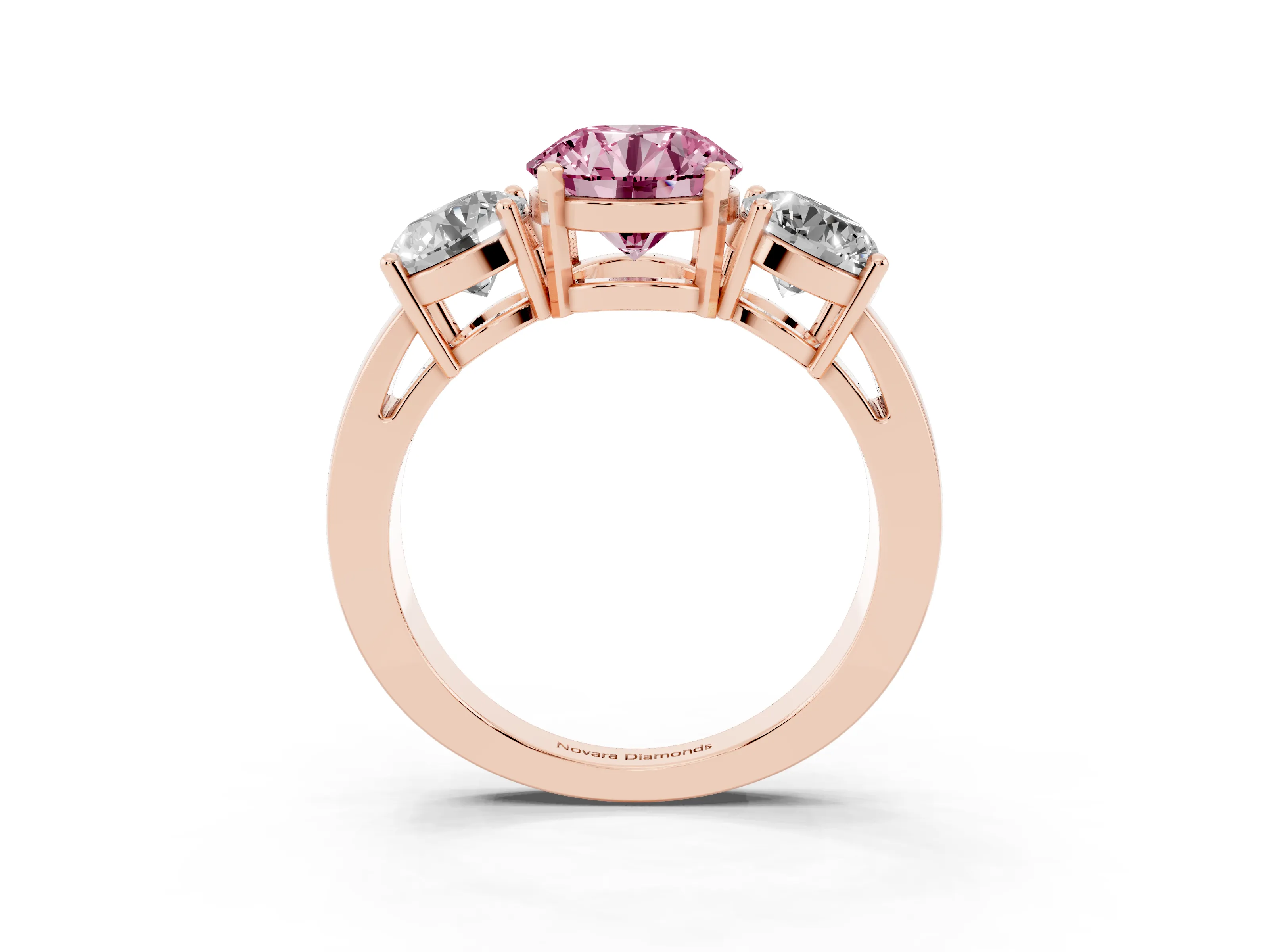 Fancy Pink Round Cut Diamond Three-Stone Ring Set in Rose gold with Round Side Stones and Classic Band