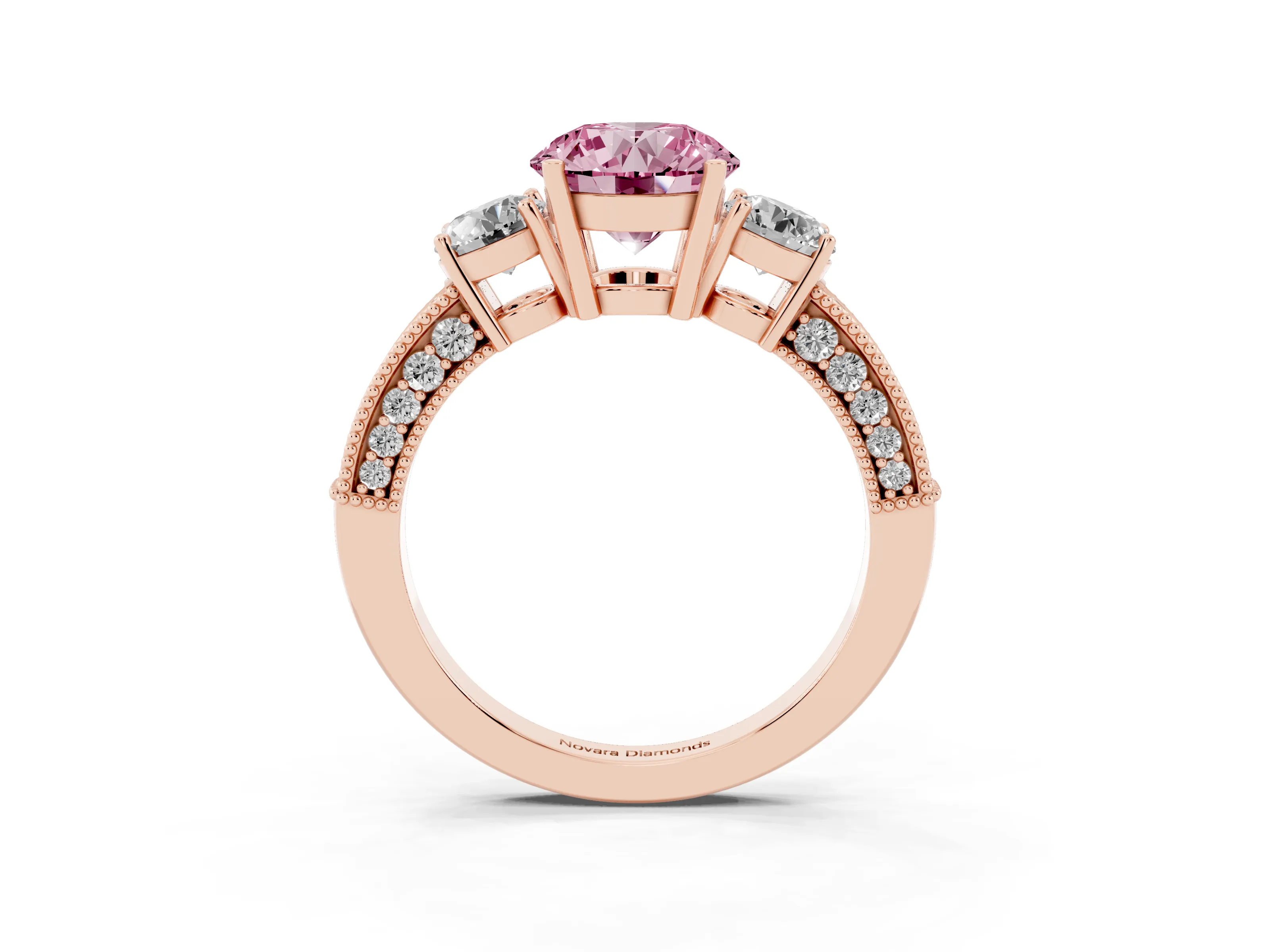 Fancy Pink Round Cut Diamond Three-Stone Ring Set in Rose gold with Round Side Stones and Pavé Band