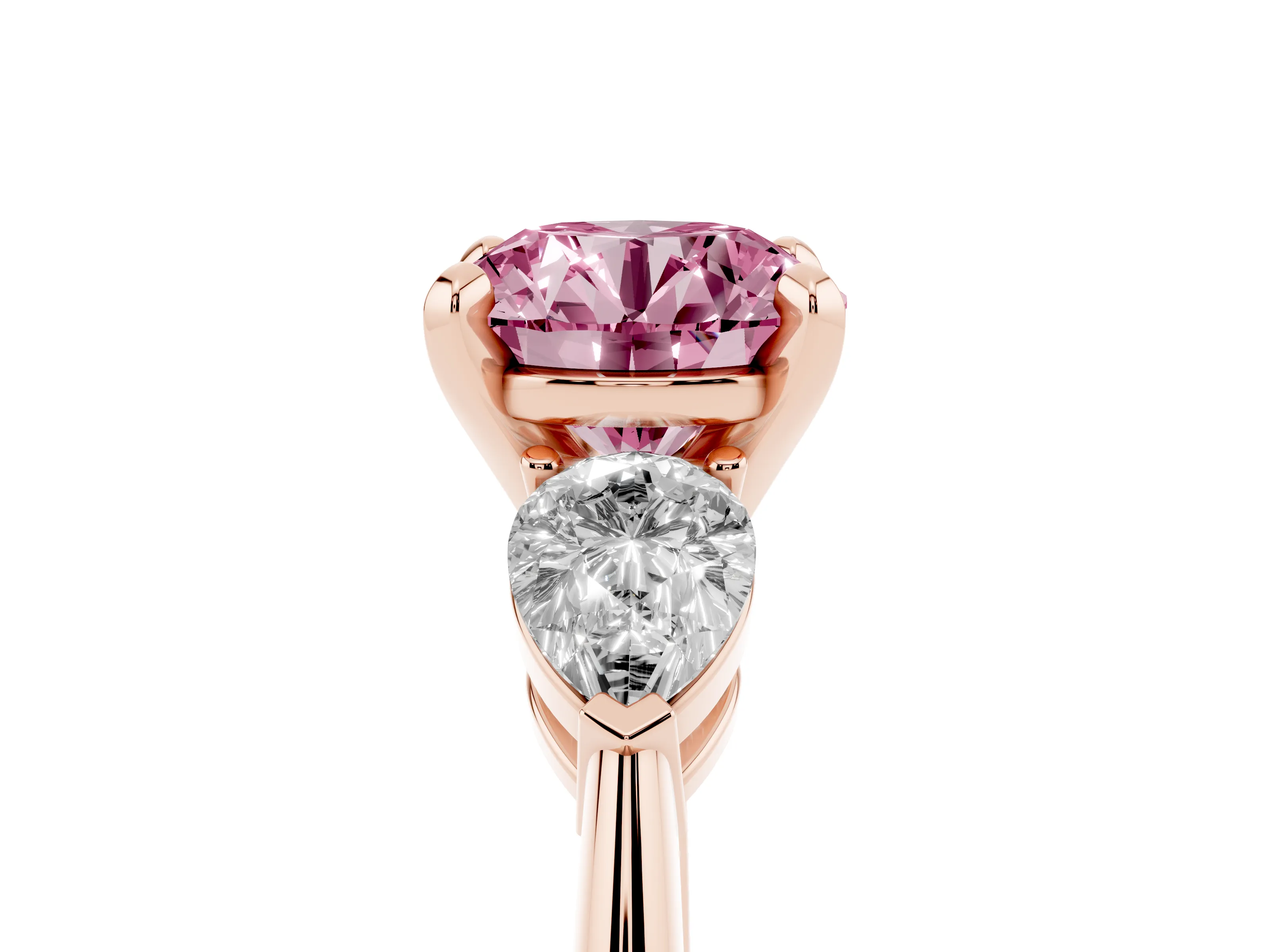Fancy Pink Three-Stone Round Cut Diamond Ring Set in Rose gold with Pear Side Stones and Prong Setting