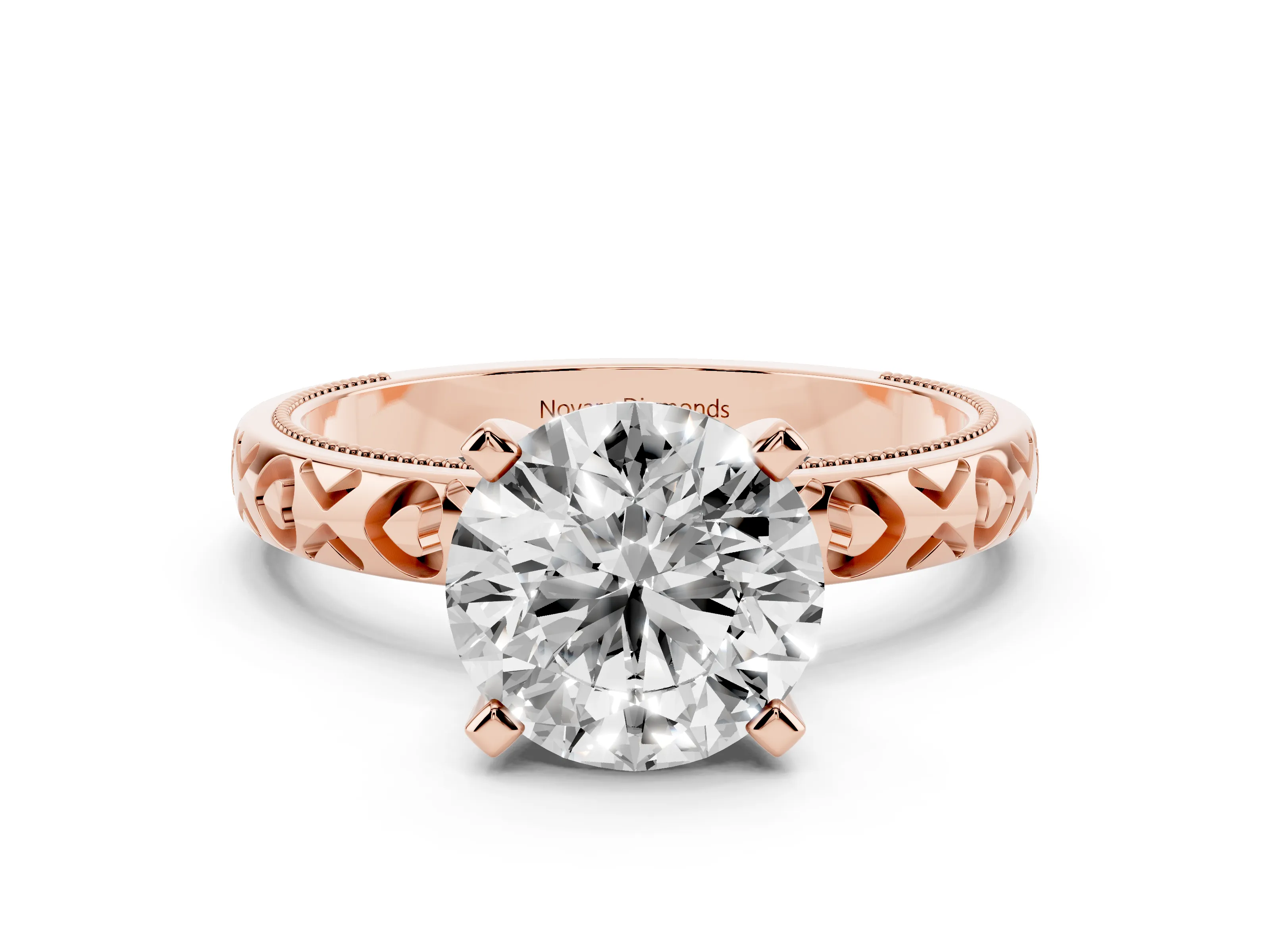 Round Cut Diamond Solitaire Engagement Ring Set in Rose gold with XO Engraved Band and Prong Setting