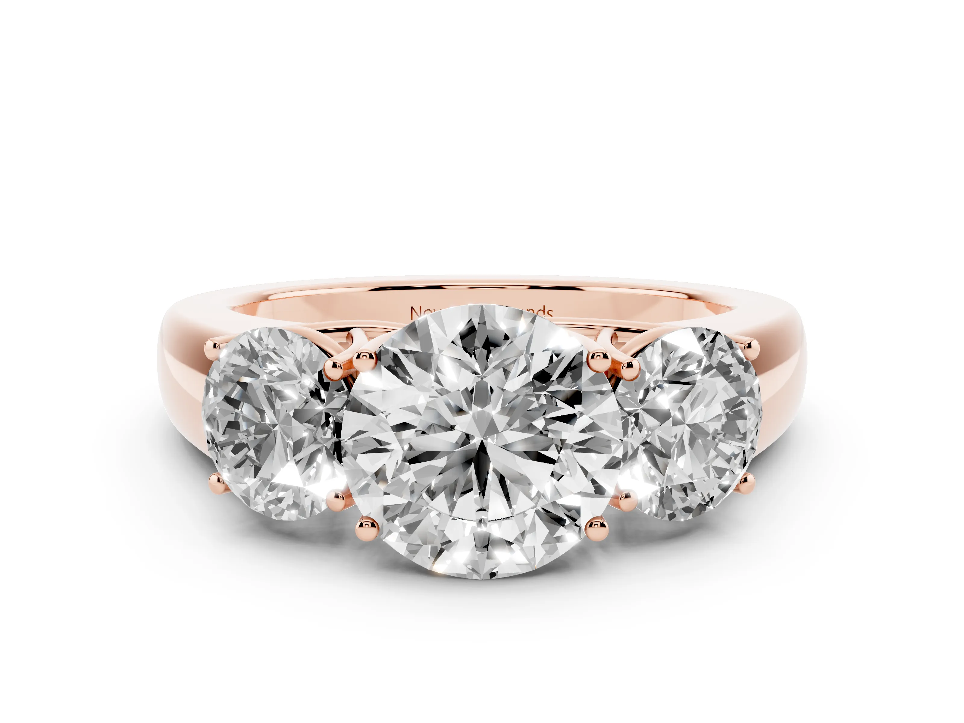 Three-Stone Round Cut Diamond Ring Set in Rose gold with Matching Prong Settings and Plain Band