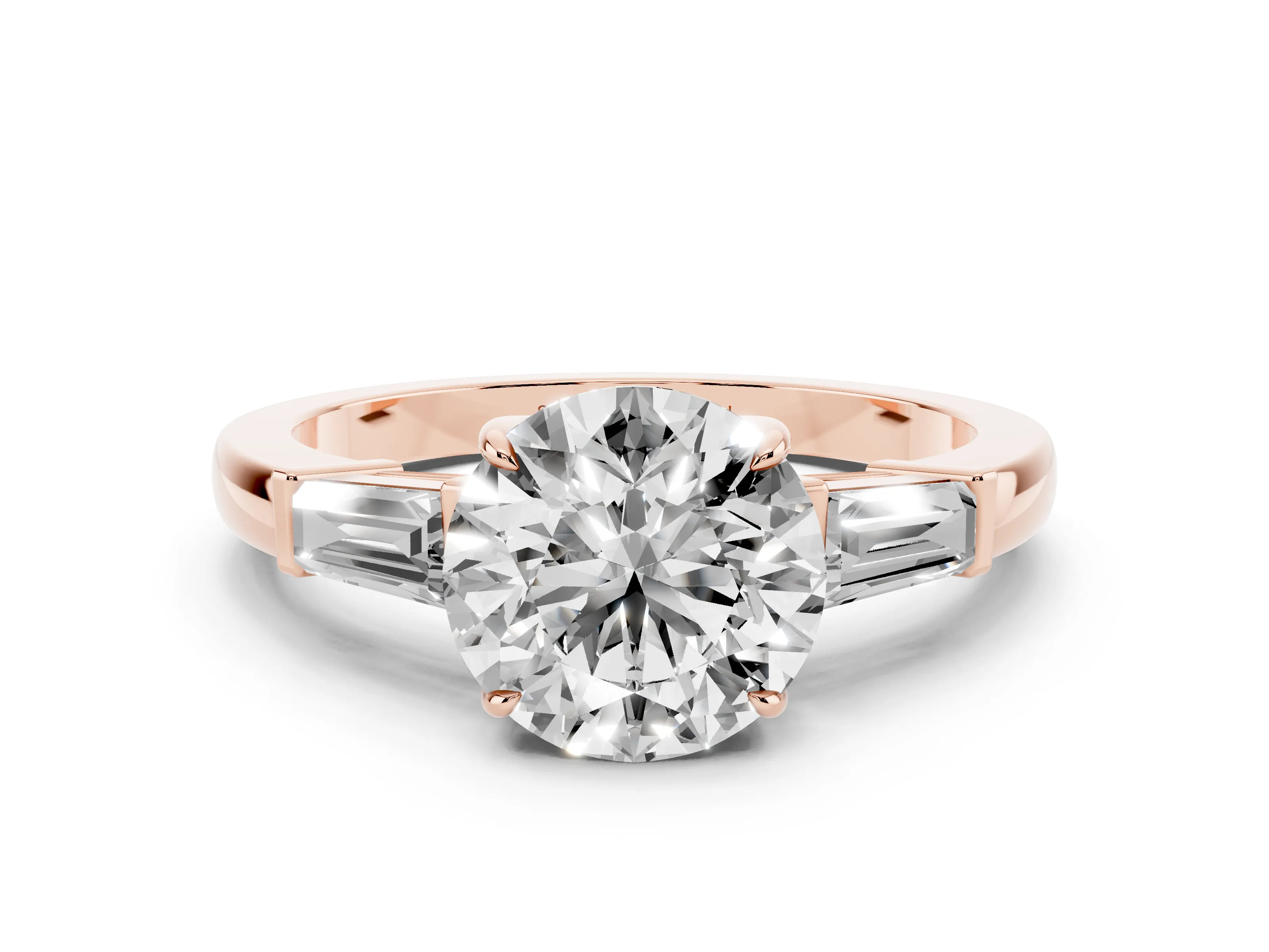 Round Cut Diamond Three-Stone Ring Set in Rose gold with Tapered Baguette Side Stones and Prong Setting